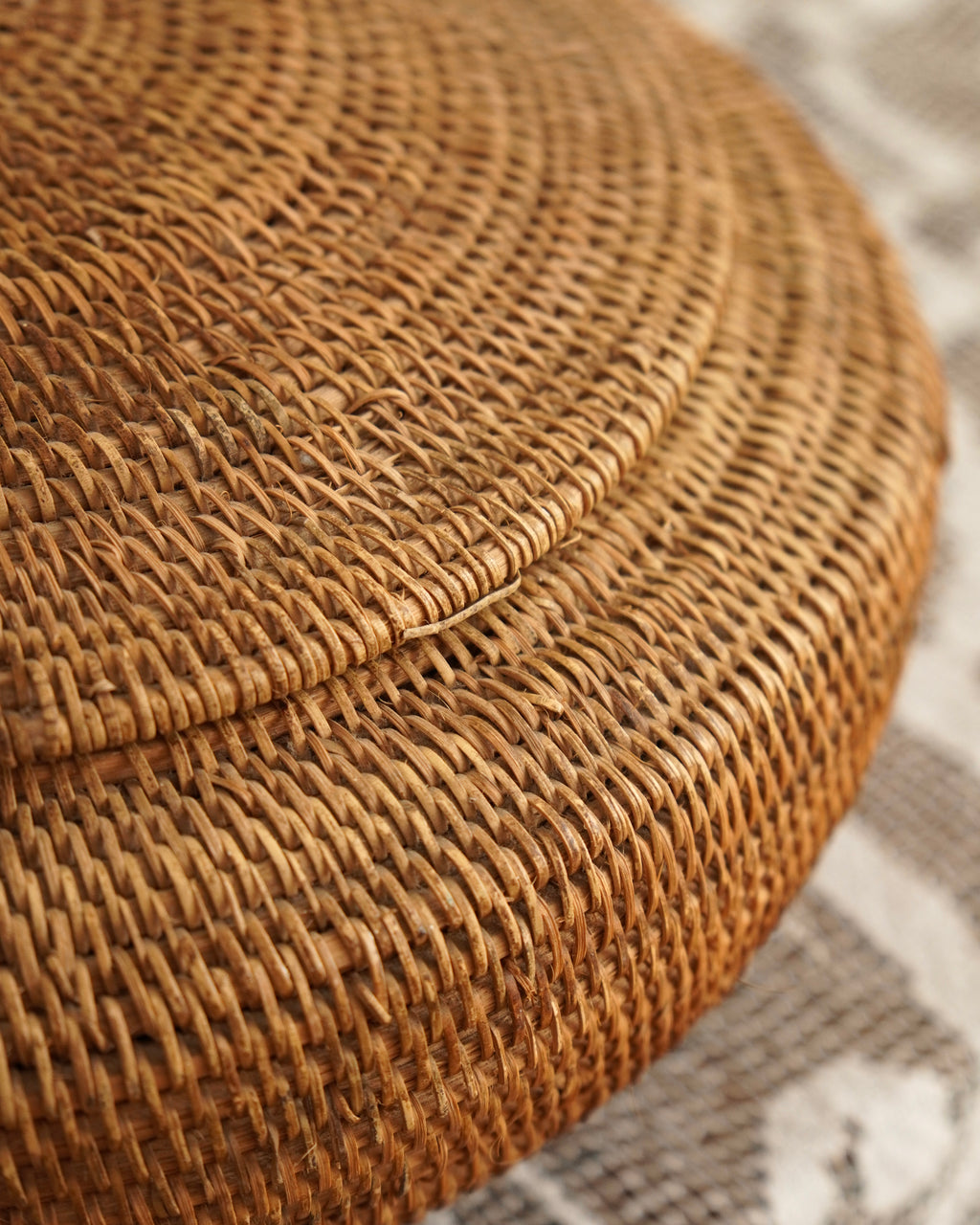 Large woven rattan container with lid