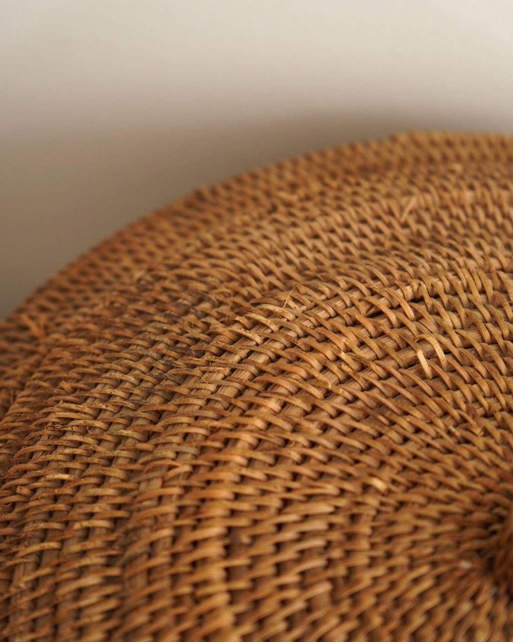 Large woven rattan container with lid