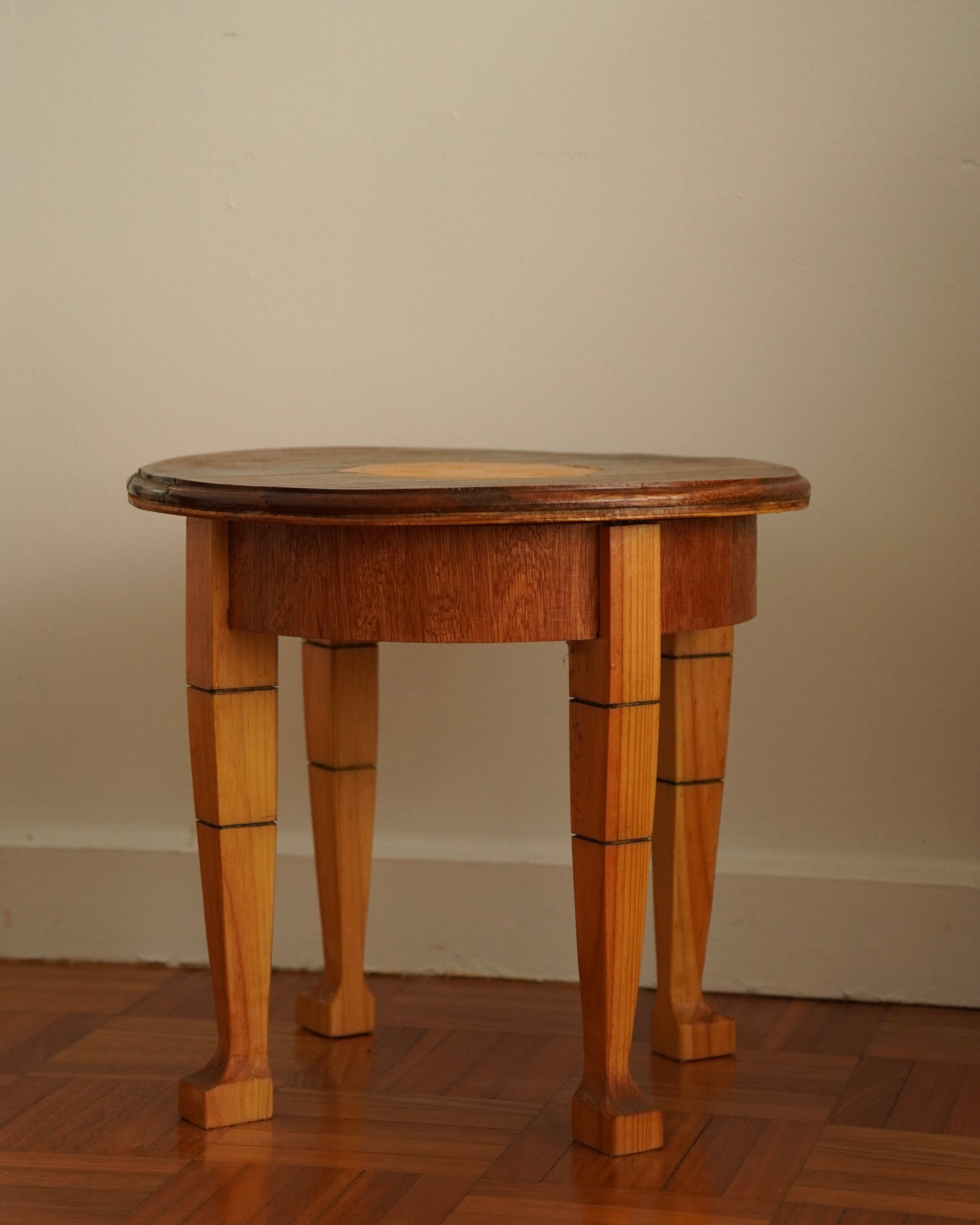 Round wood marquetry table