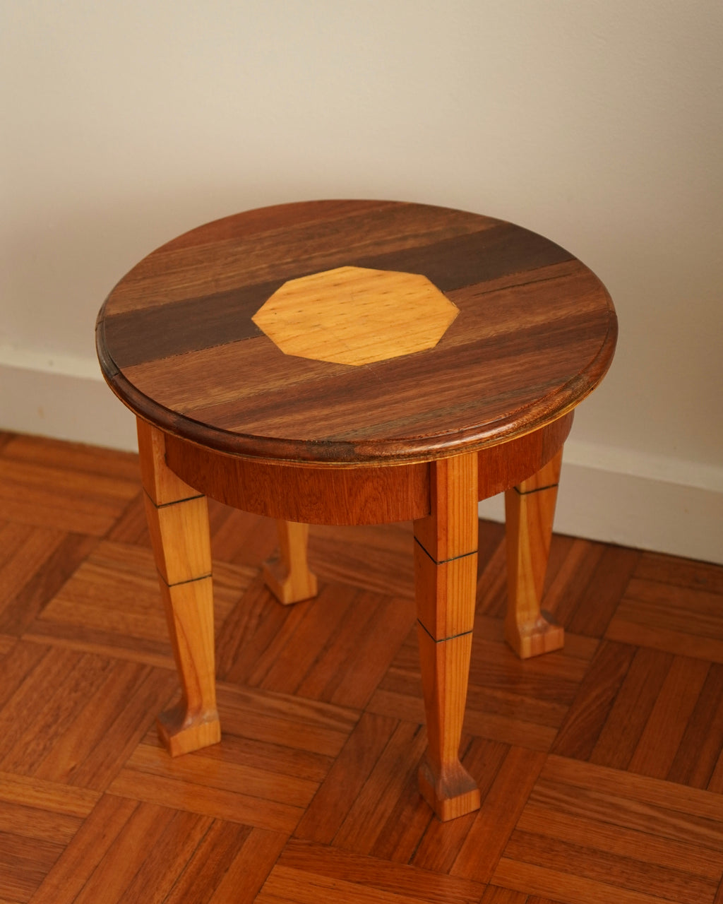 Round wood marquetry table