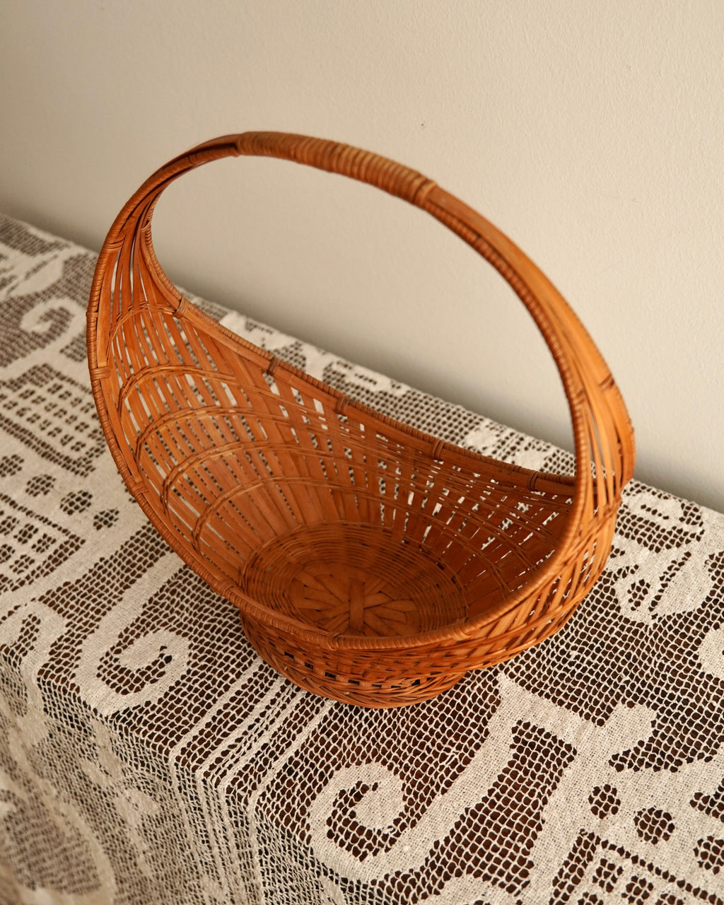 Woven rattan basket with handle