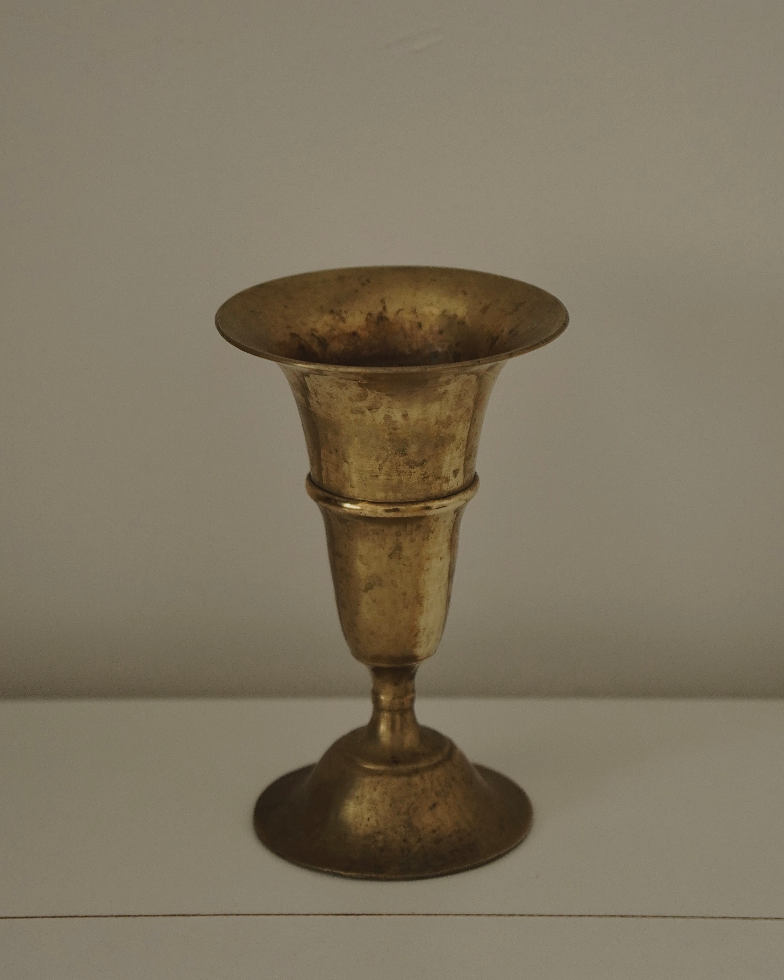 Brass tapered vase with round tapered base
