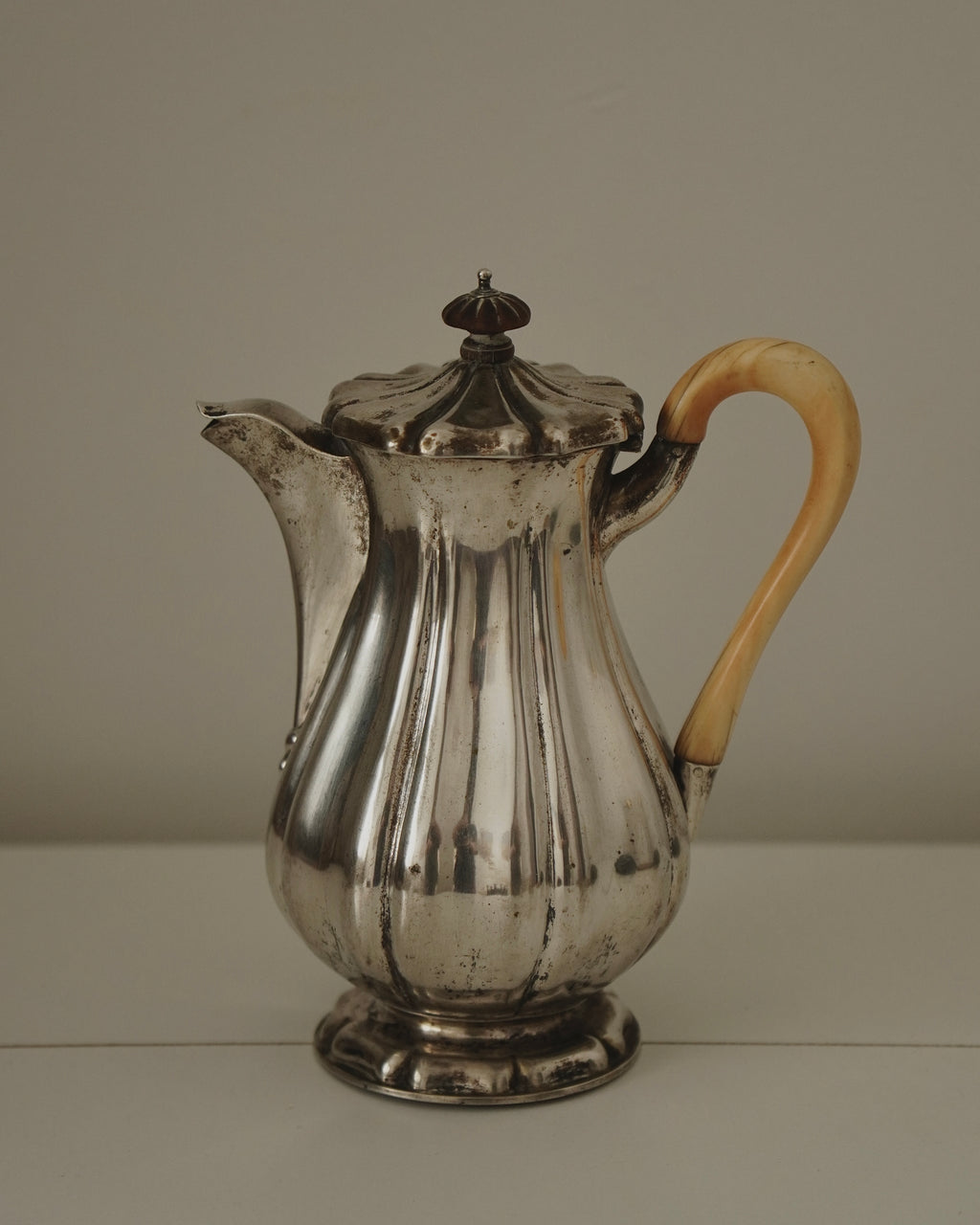 Silver plated jug with handle and lid