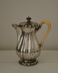 Silver plated jug with handle and lid