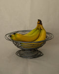 Wire like metal bowl with round soldering details