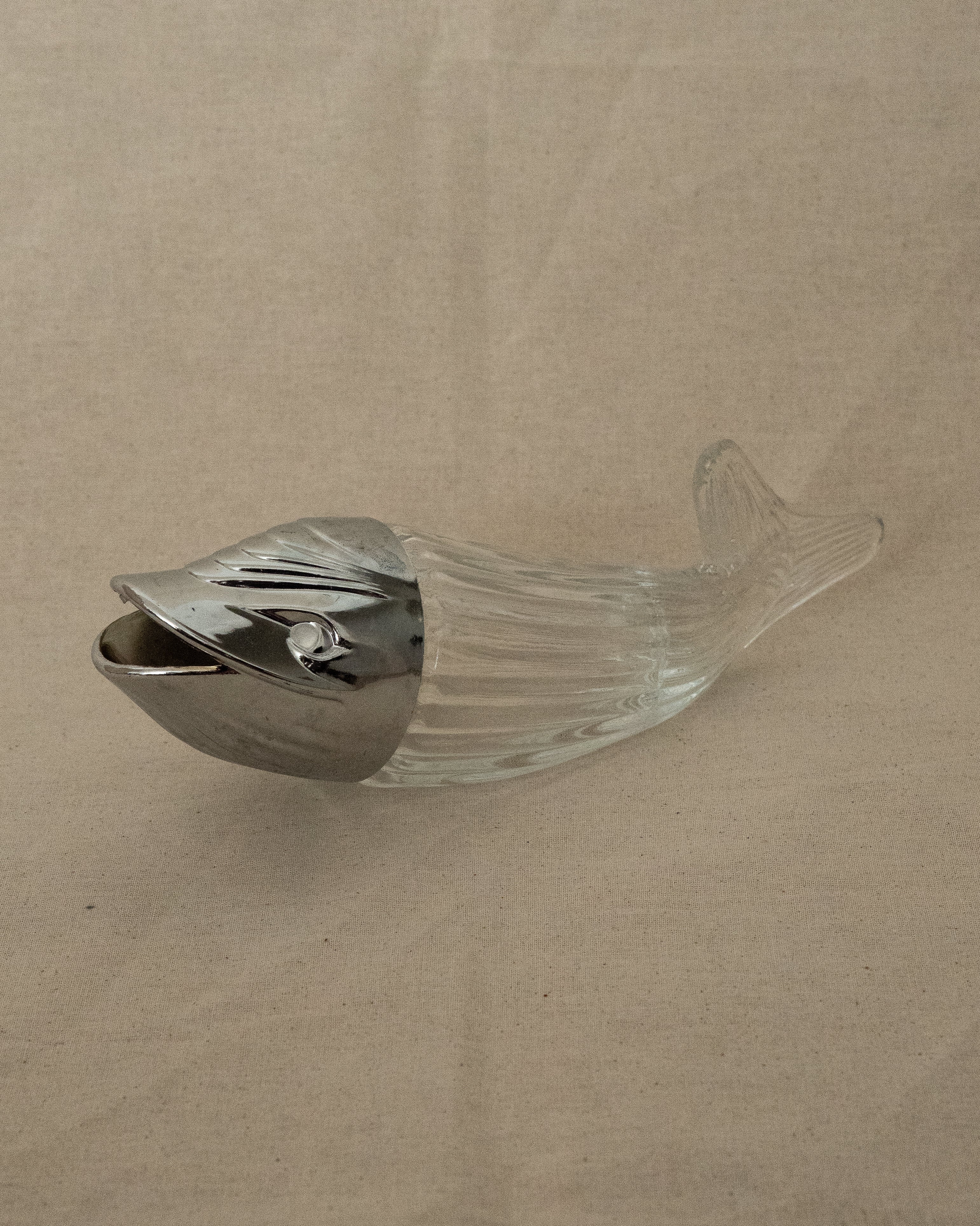 Silver coloured fish glass