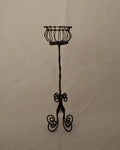 Wrought iron candle holder with spiral feet, holds 1 pillar candle