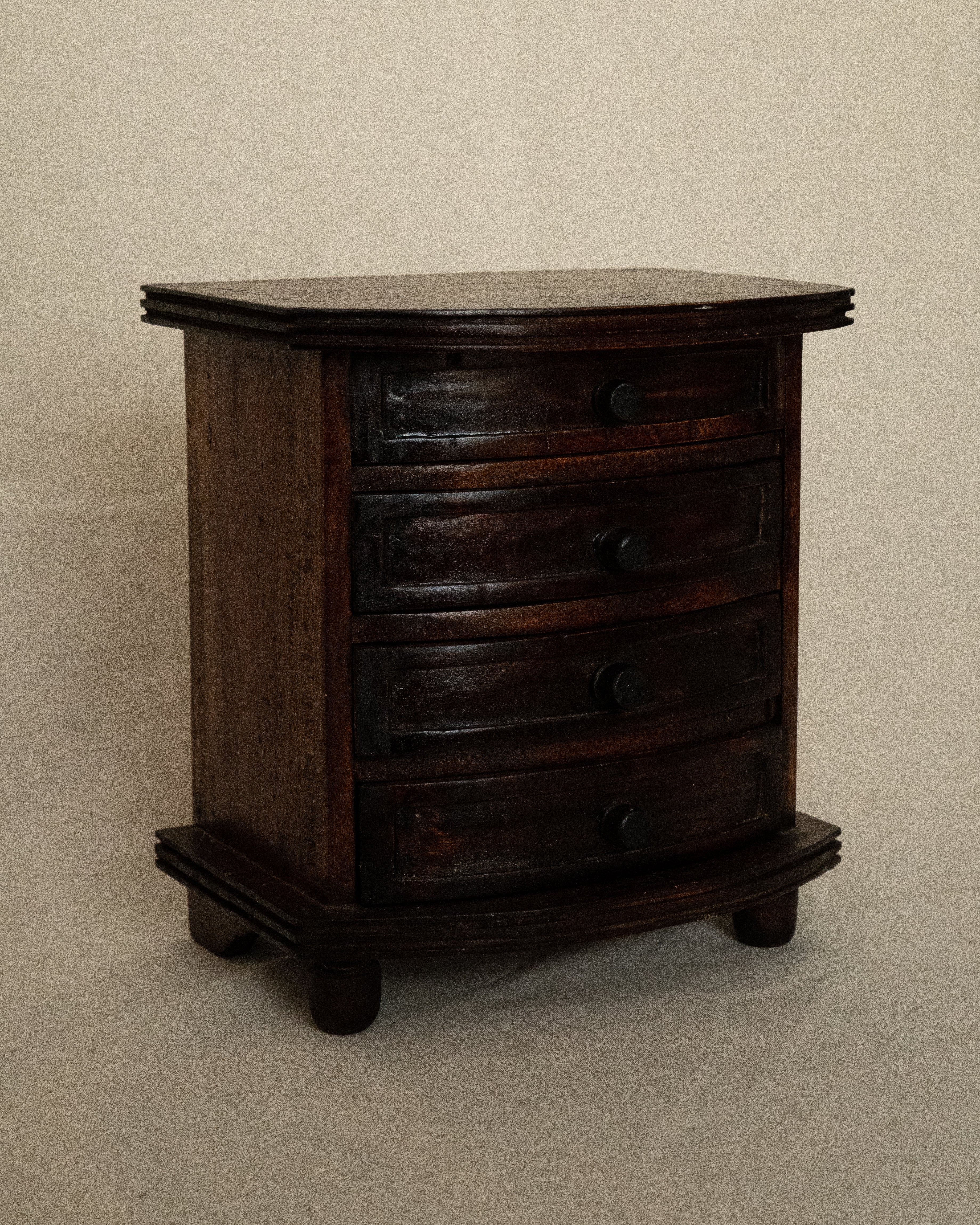 Small wooden chest of drawers