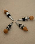 Wood and metal wine stoppers