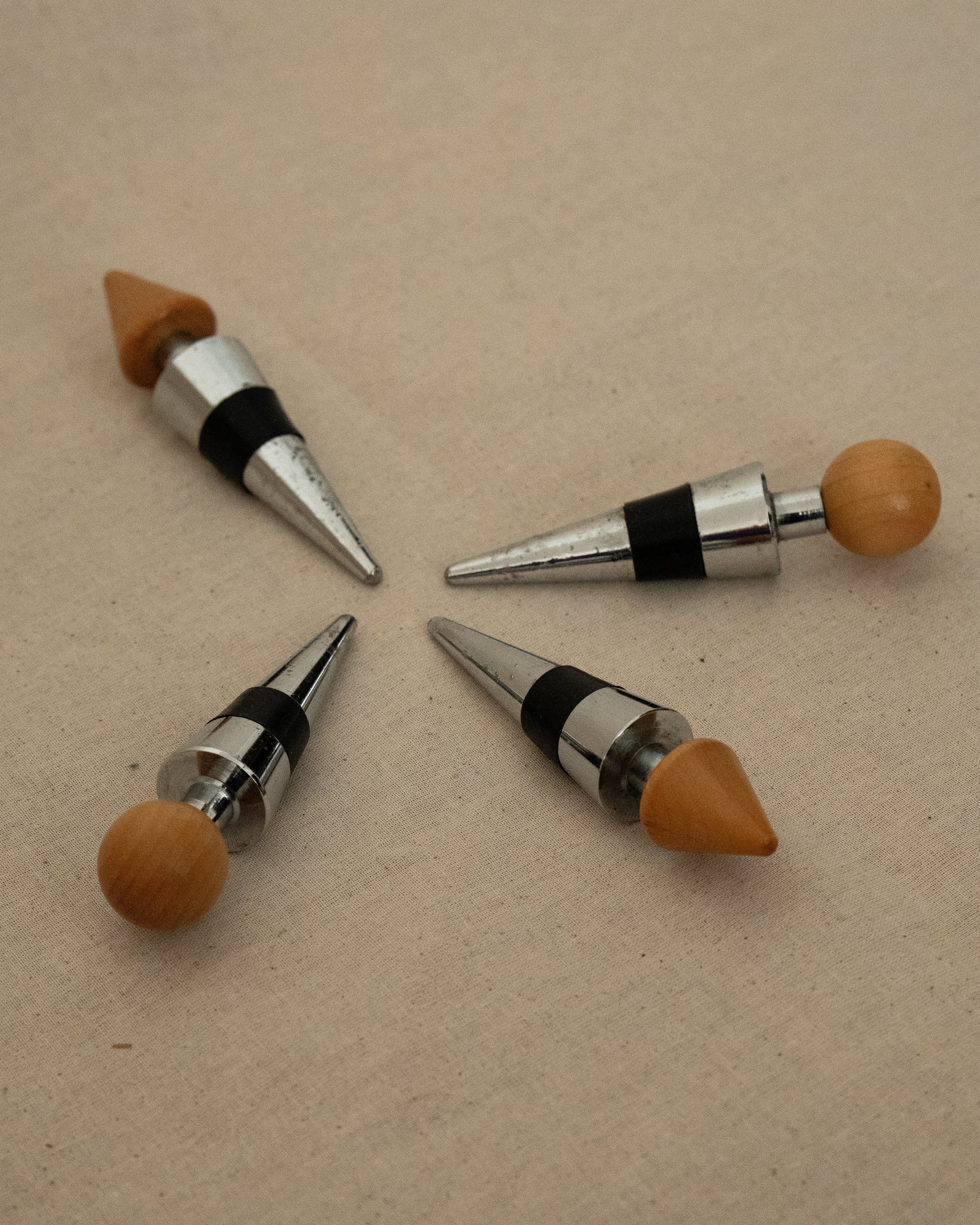 Wood and metal wine stoppers