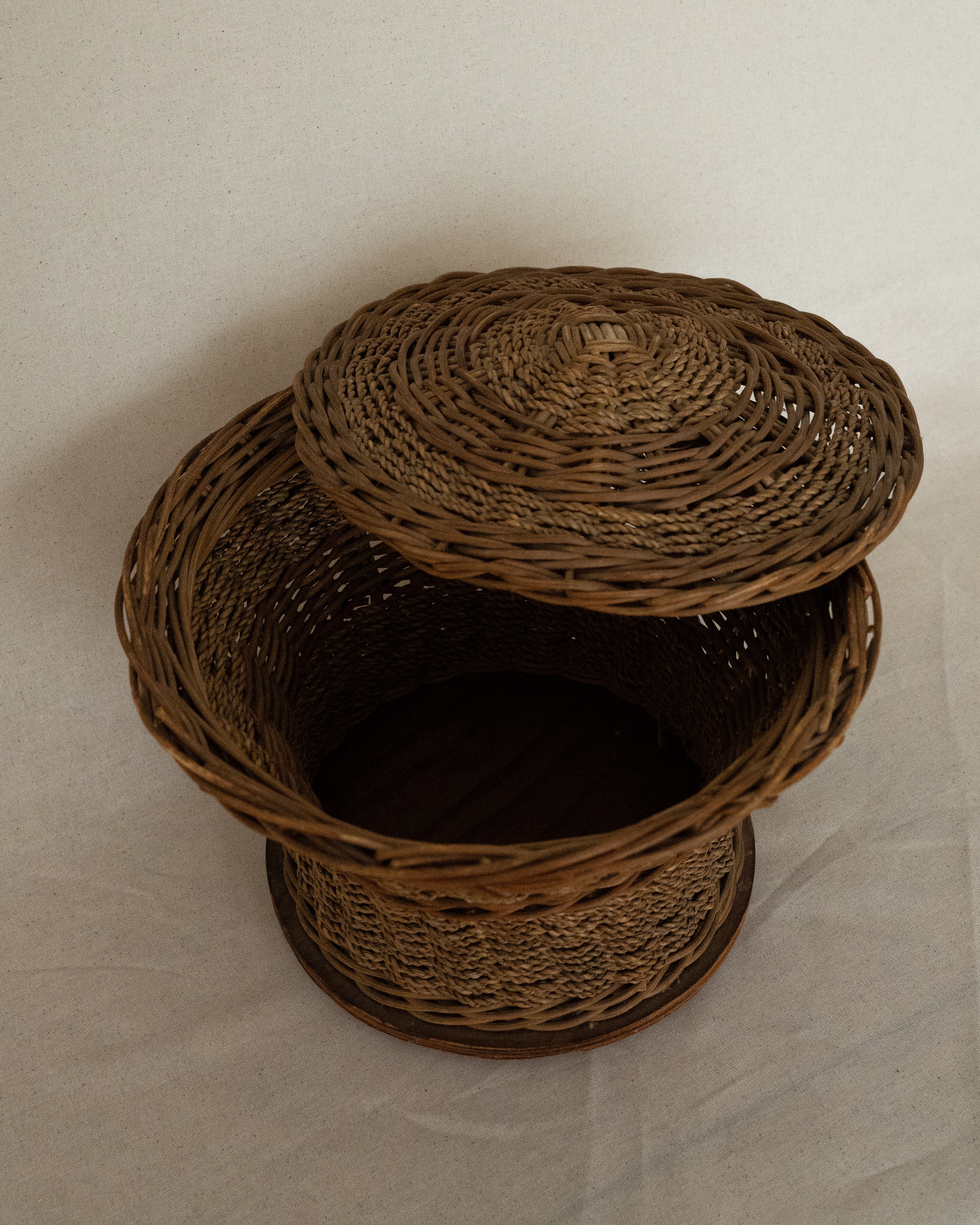 Rattan and rope woven basket with lid