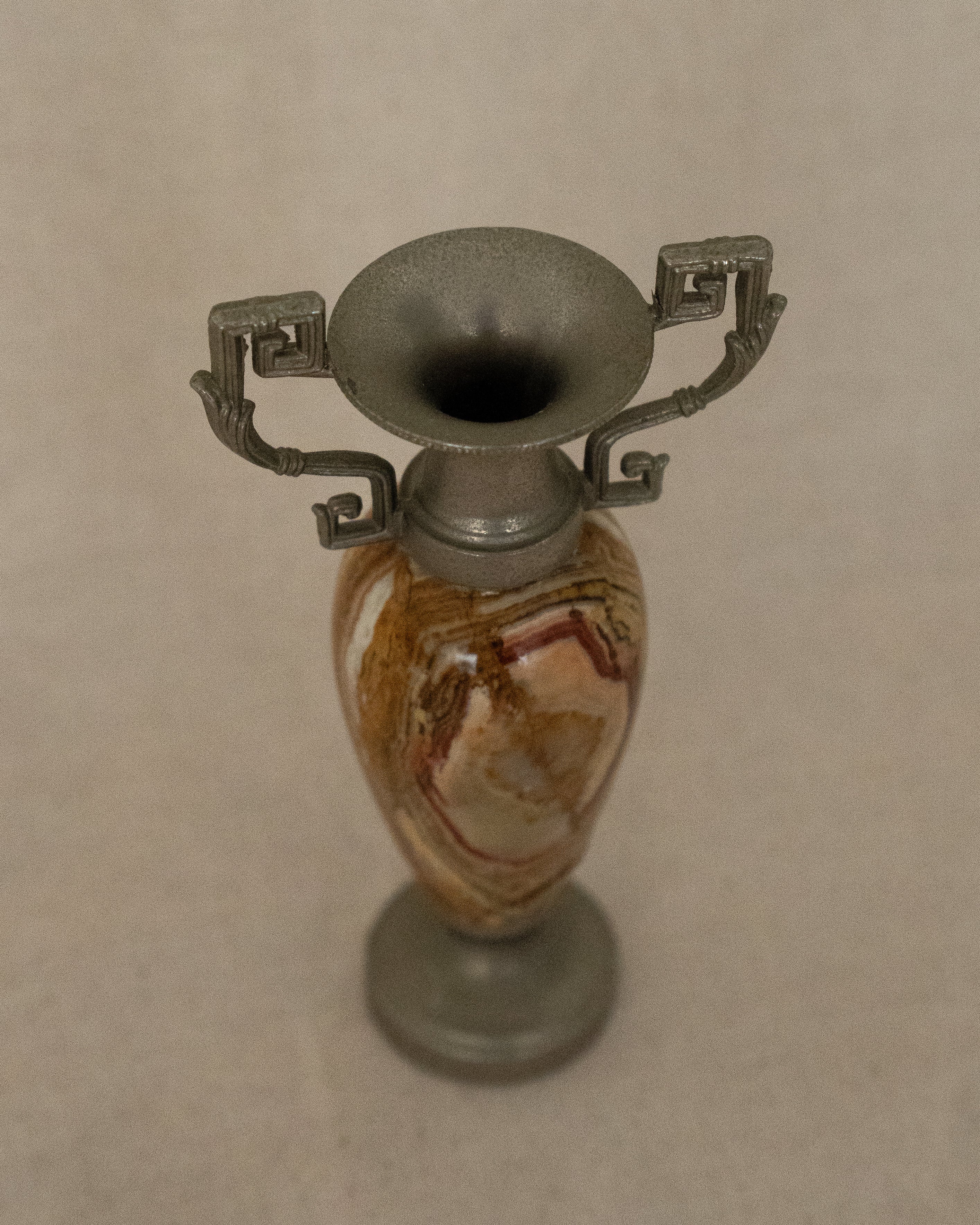 Small stone urn single stem vase with intricate handles (orange)