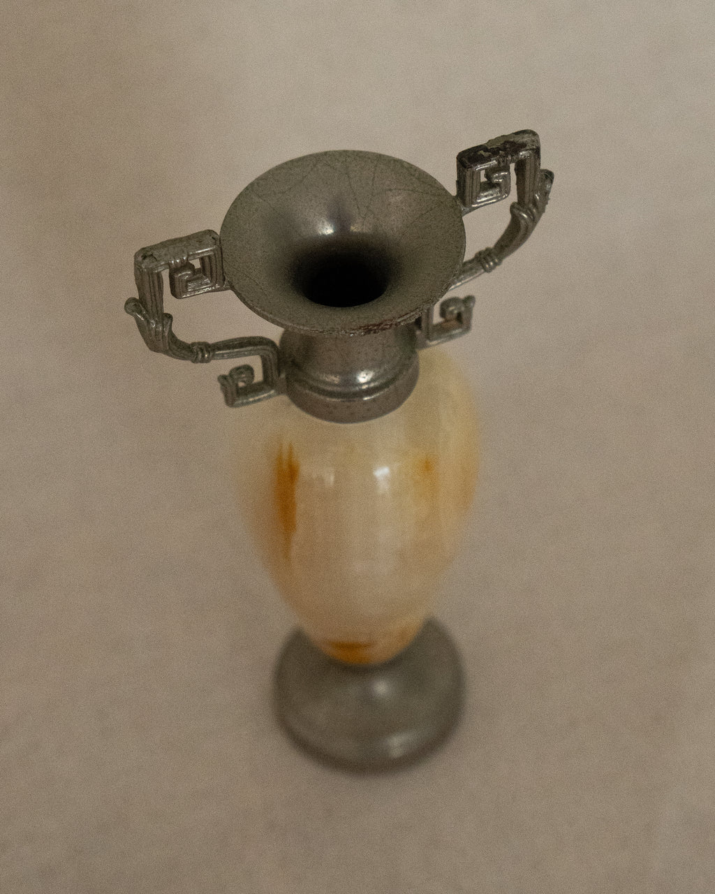 Small stone urn single stem vase with intricate handles (white)