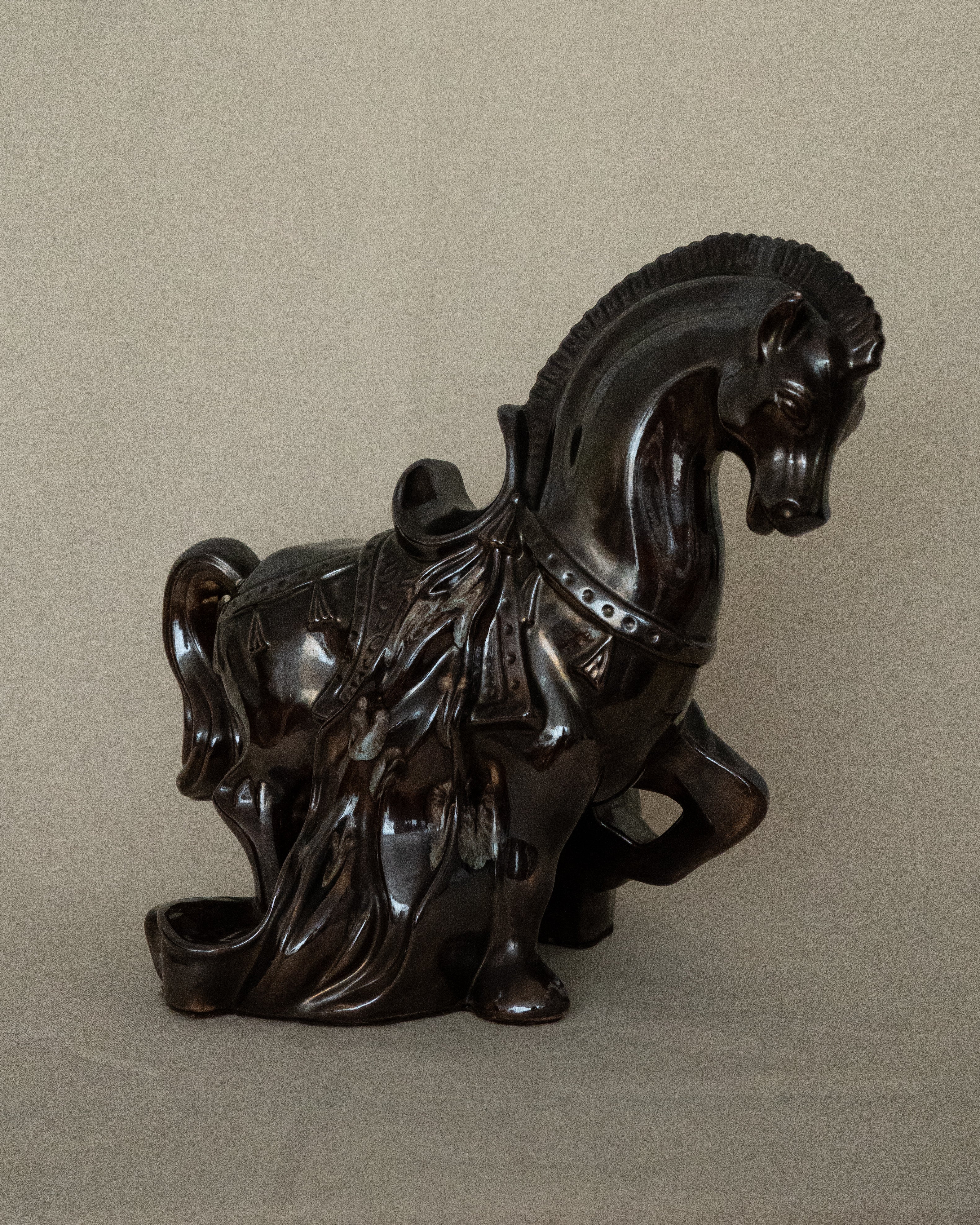 Brown ceramic horse with drip details