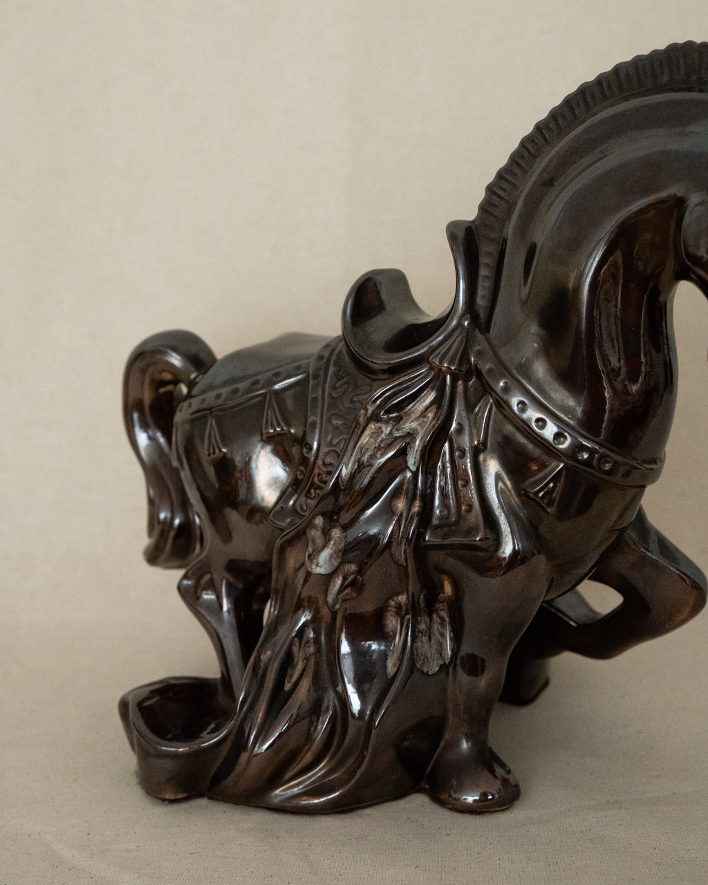 Brown ceramic horse with drip details