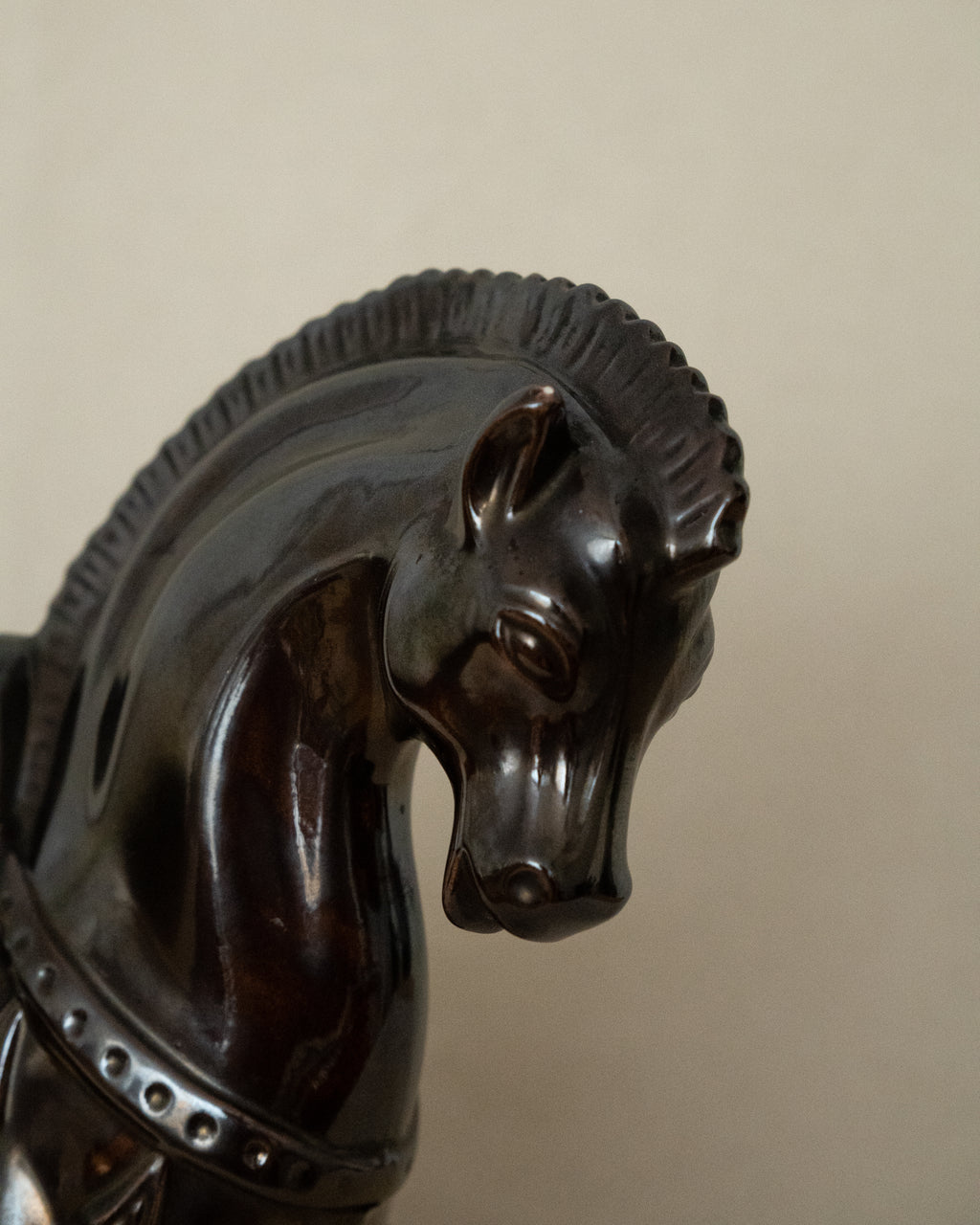 Brown ceramic horse with drip details