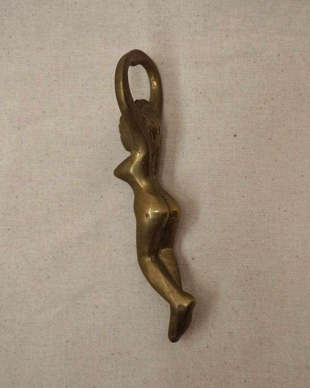 Female brass bottle opener