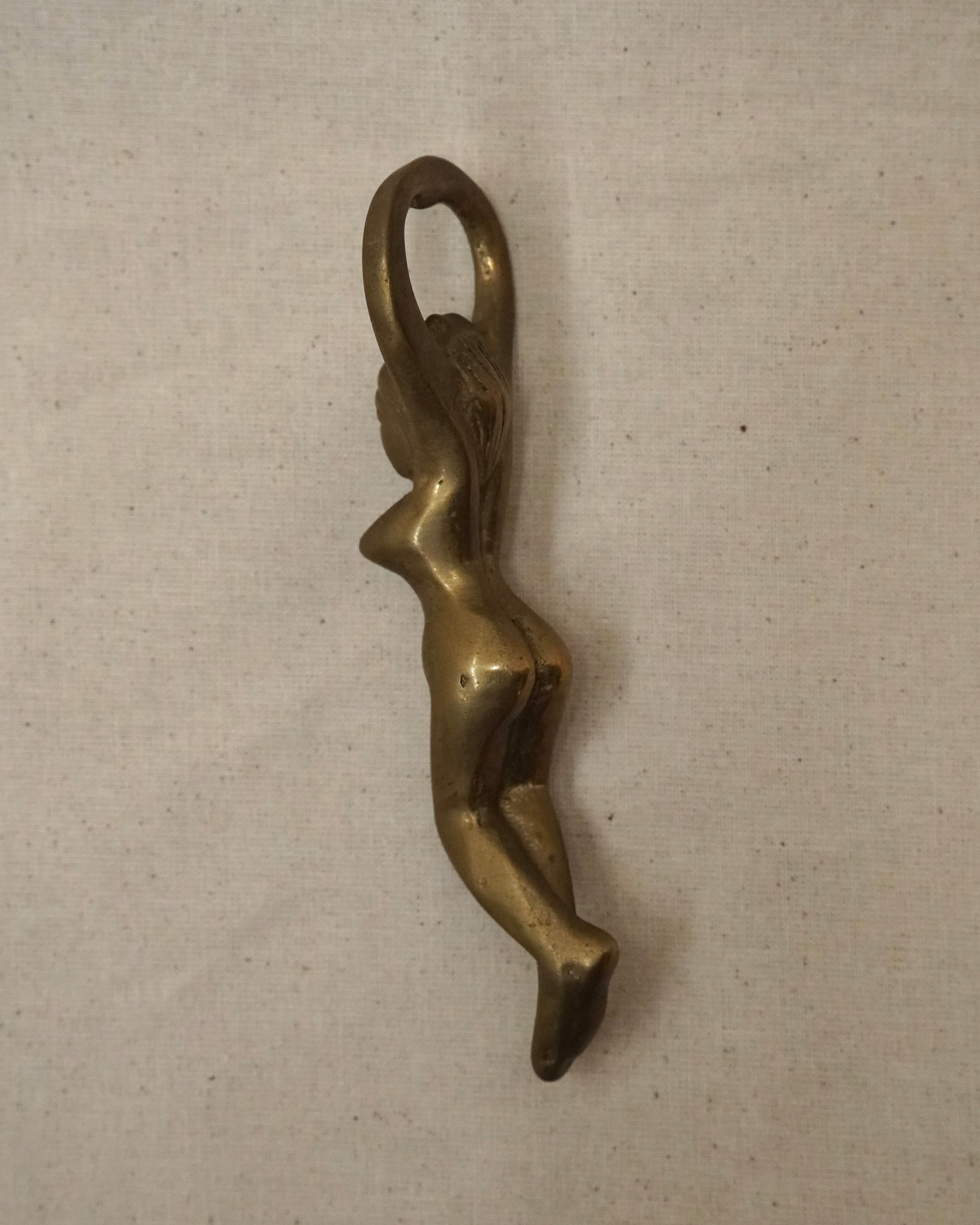 Female brass bottle opener
