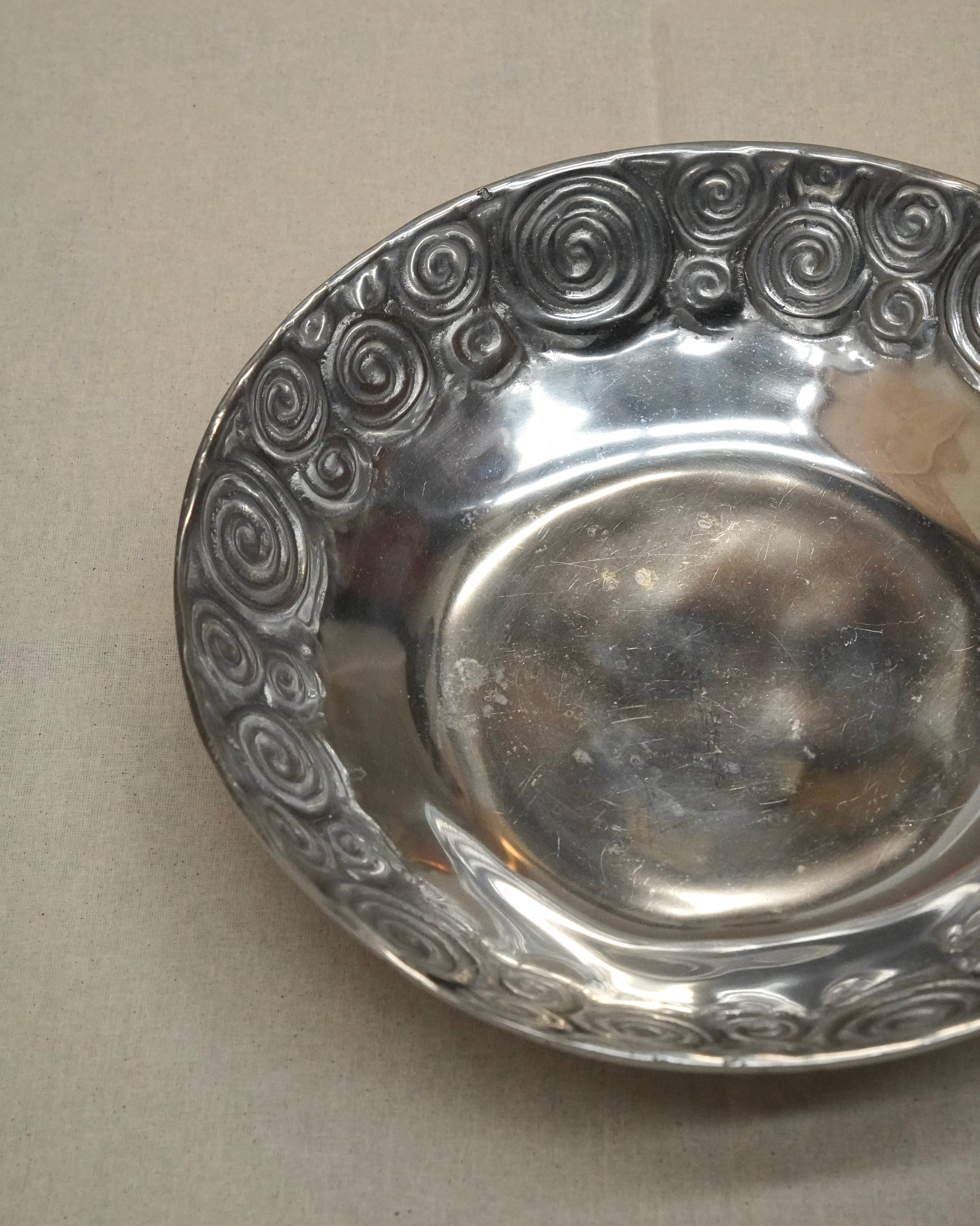 Spiral pewter bowl