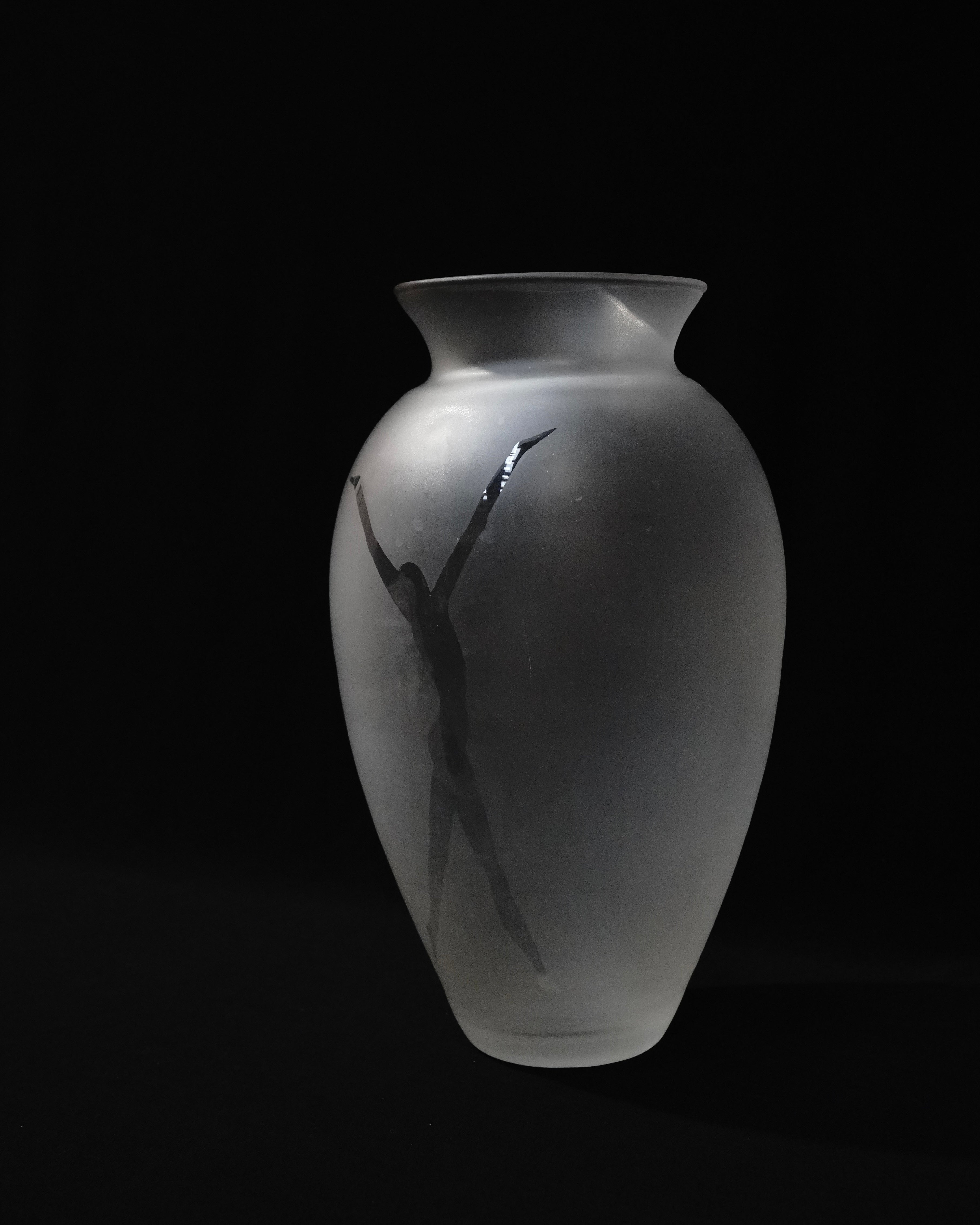 Translucent vase with human figure