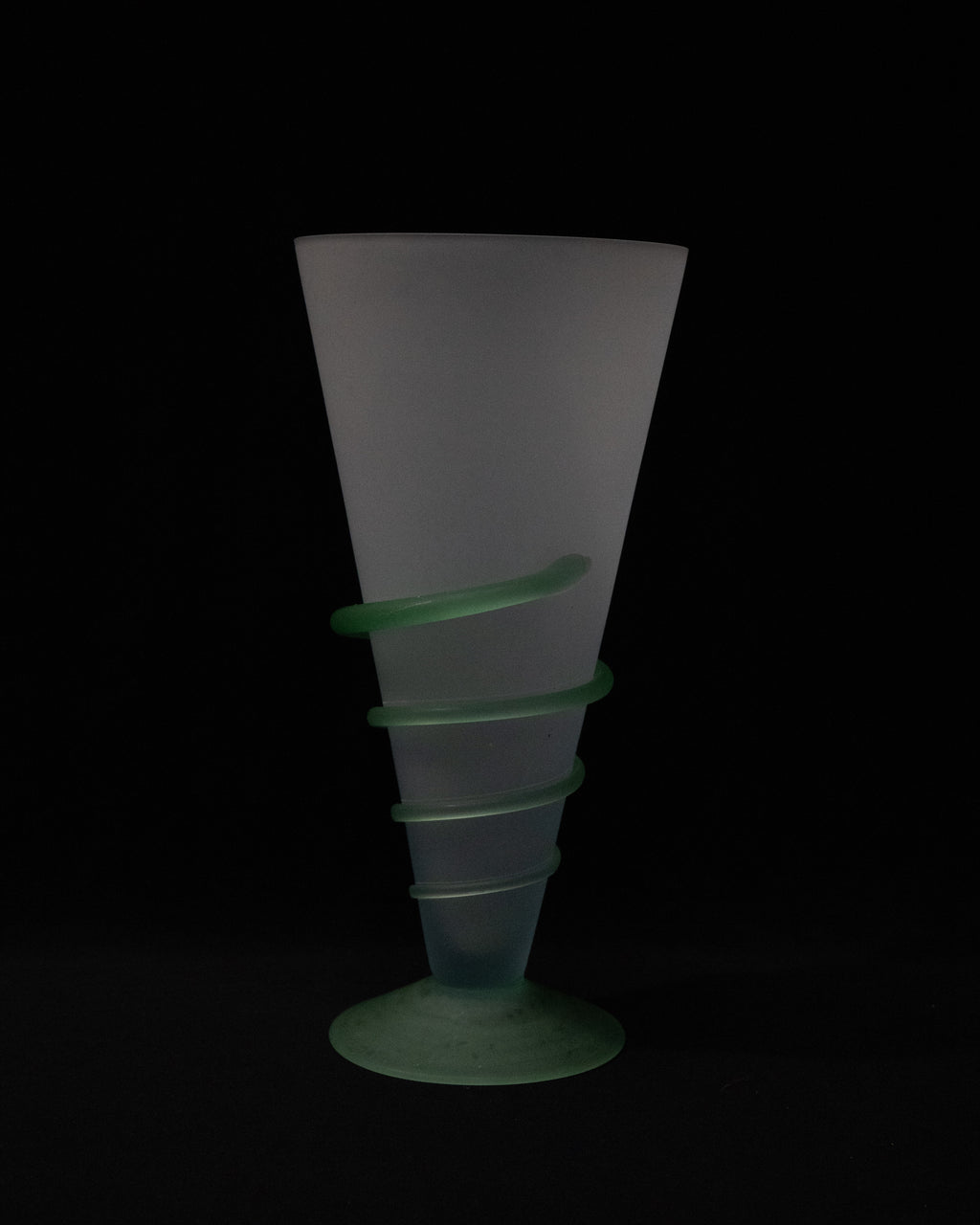 Art glass translucent vase with light green base and swirl detail