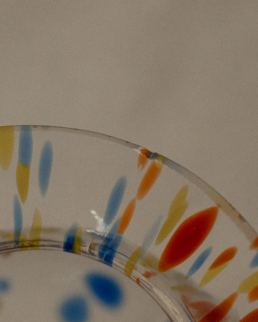 Art glass vase with colourful marks and blue base