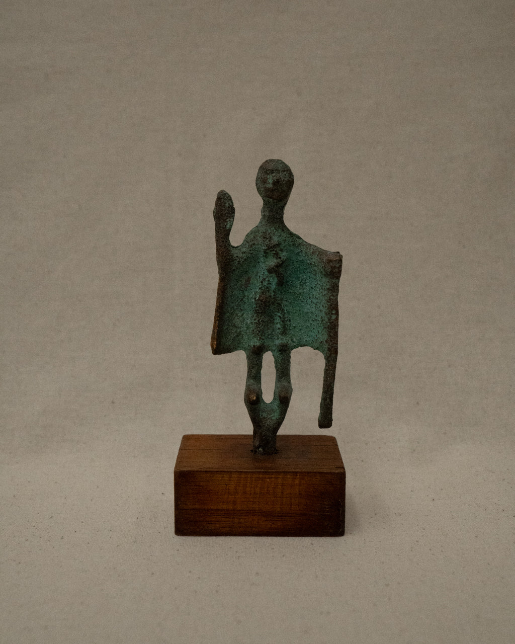 Cast Sardinian "Capotribu" (Chief of the herdsmen) bronze verdigris sculpture on wooden base