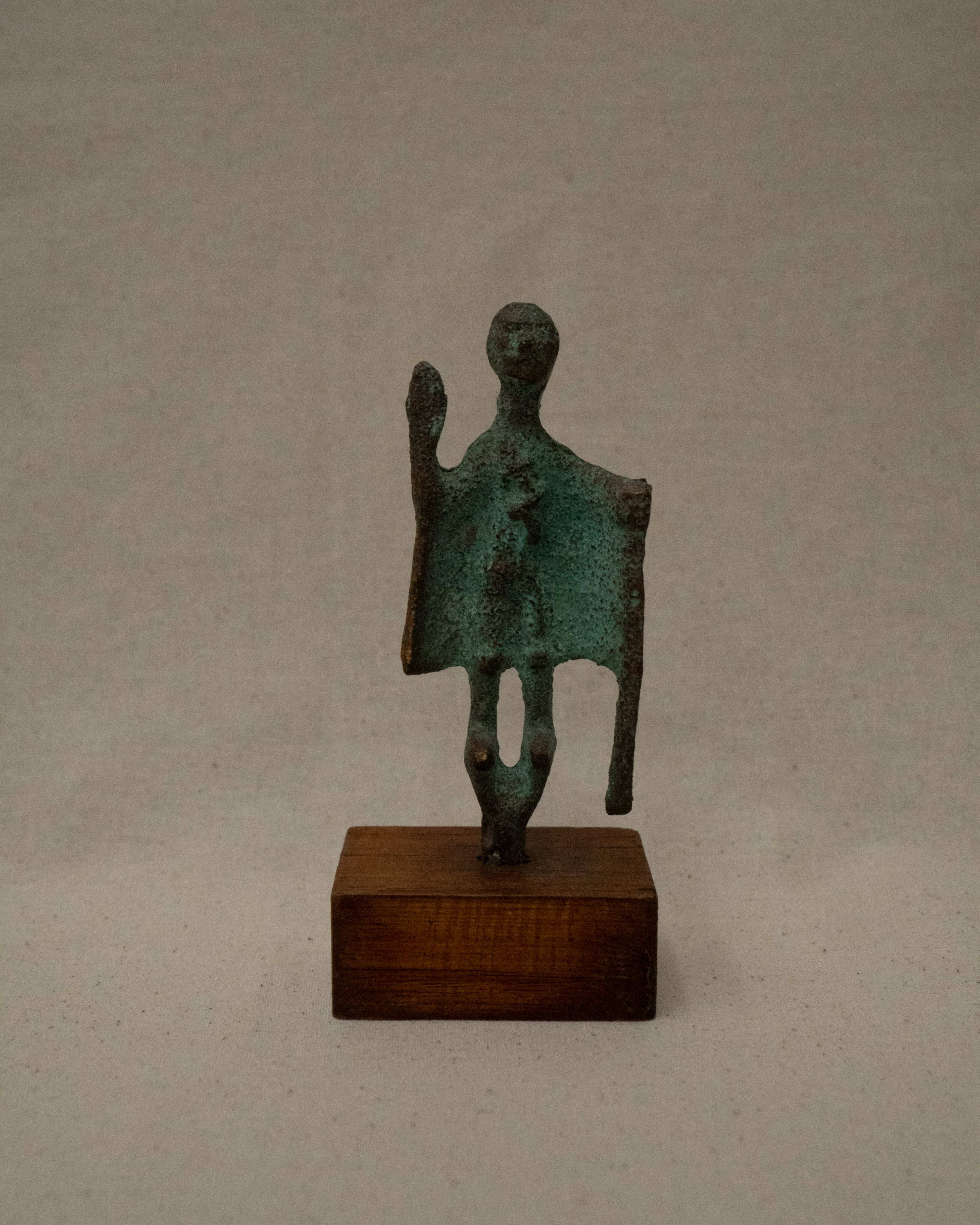 Cast Sardinian "Capotribu" (Chief of the herdsmen) bronze verdigris sculpture on wooden base