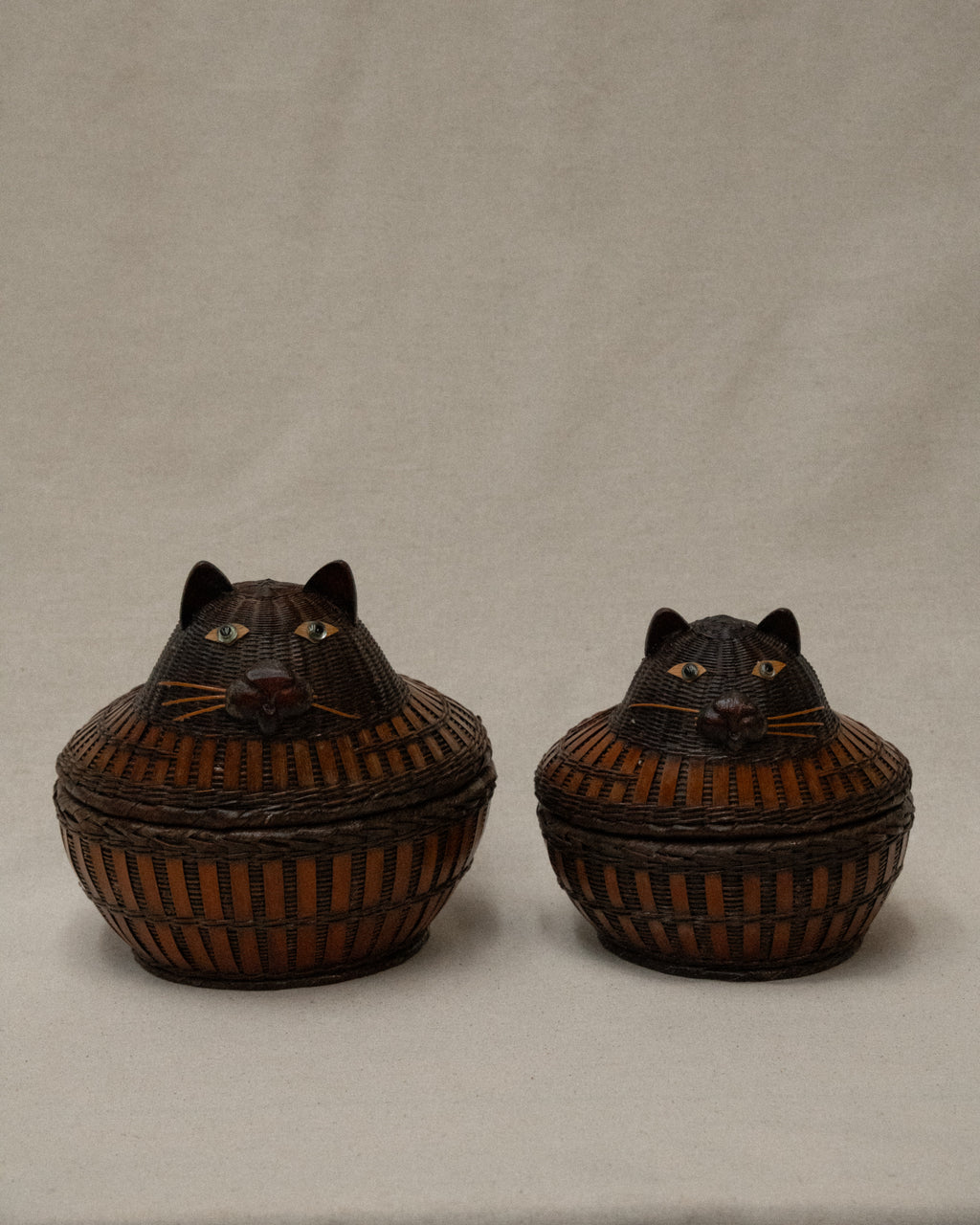 Pair of wicker cat baskets that fit into each other