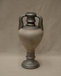 Silver and white painted terracotta vase