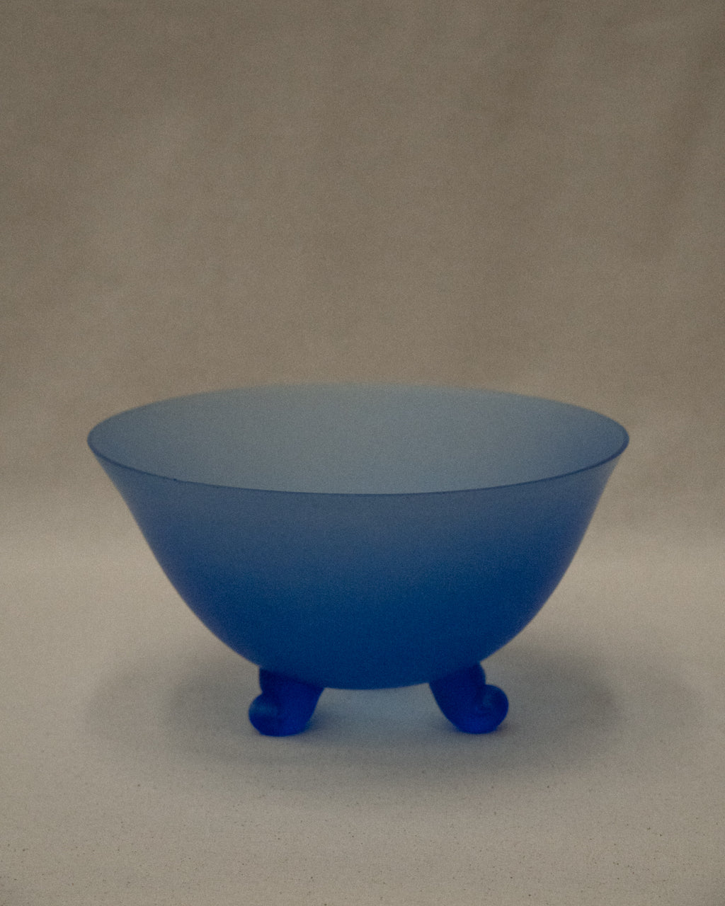 Blue glass bowl with spiral feet