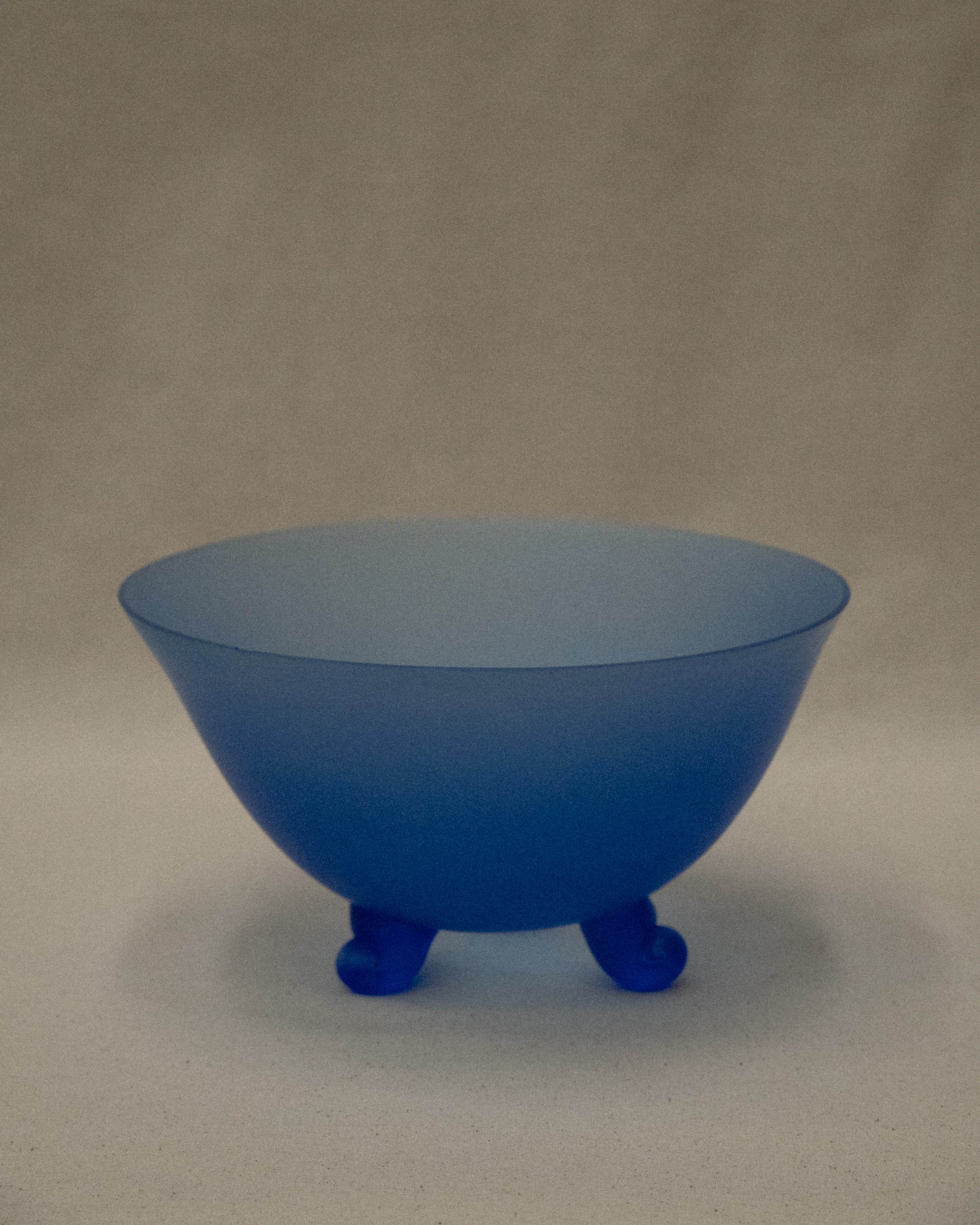 Blue glass bowl with spiral feet