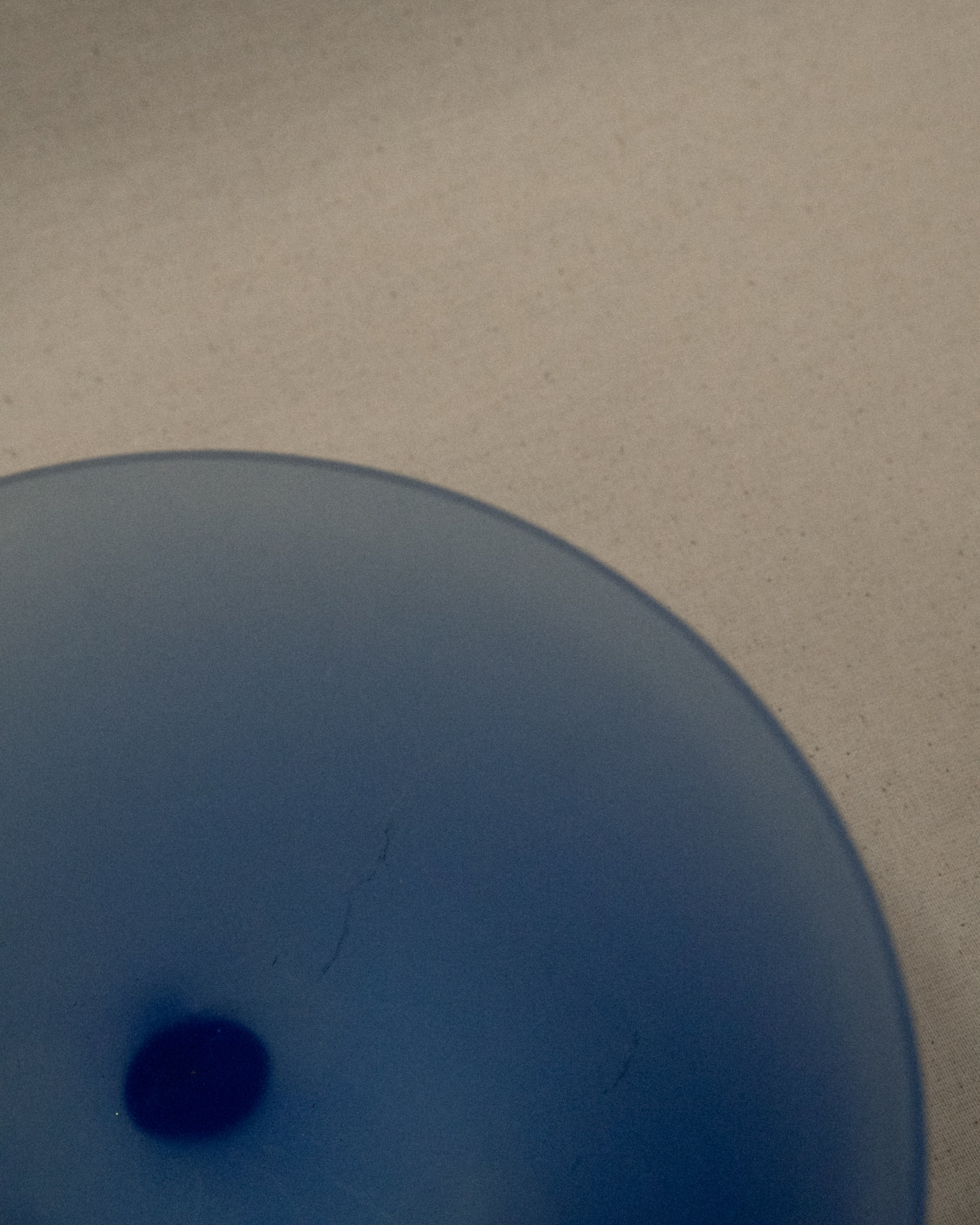 Blue glass bowl with spiral feet