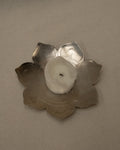 Flower shaped metal candle holder