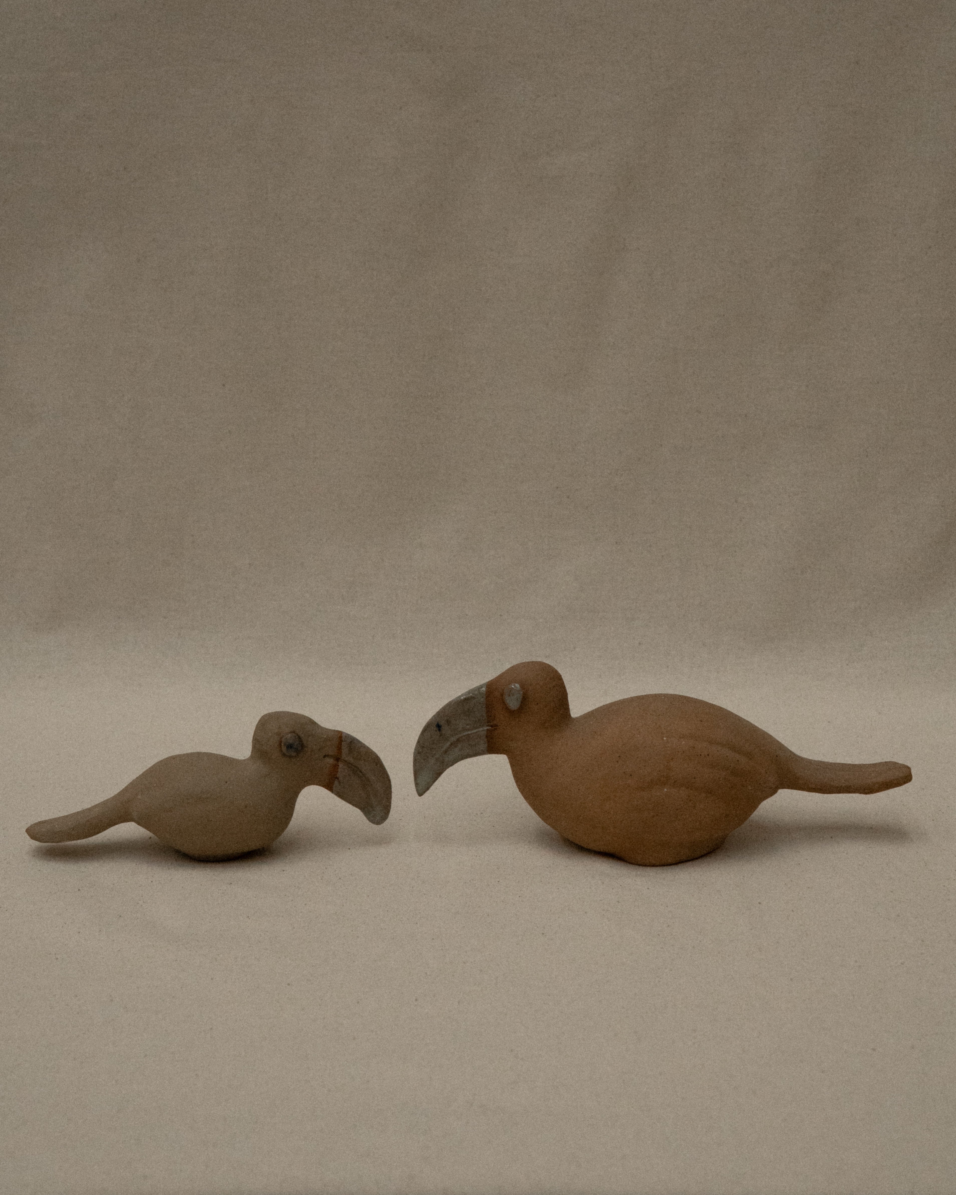 Ceramic toucans and guinea fowls