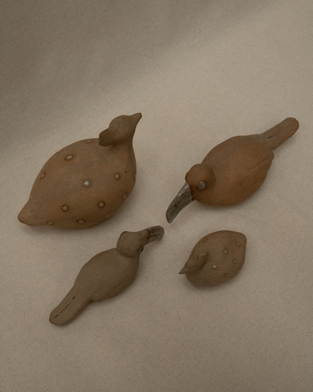 Ceramic toucans and guinea fowls