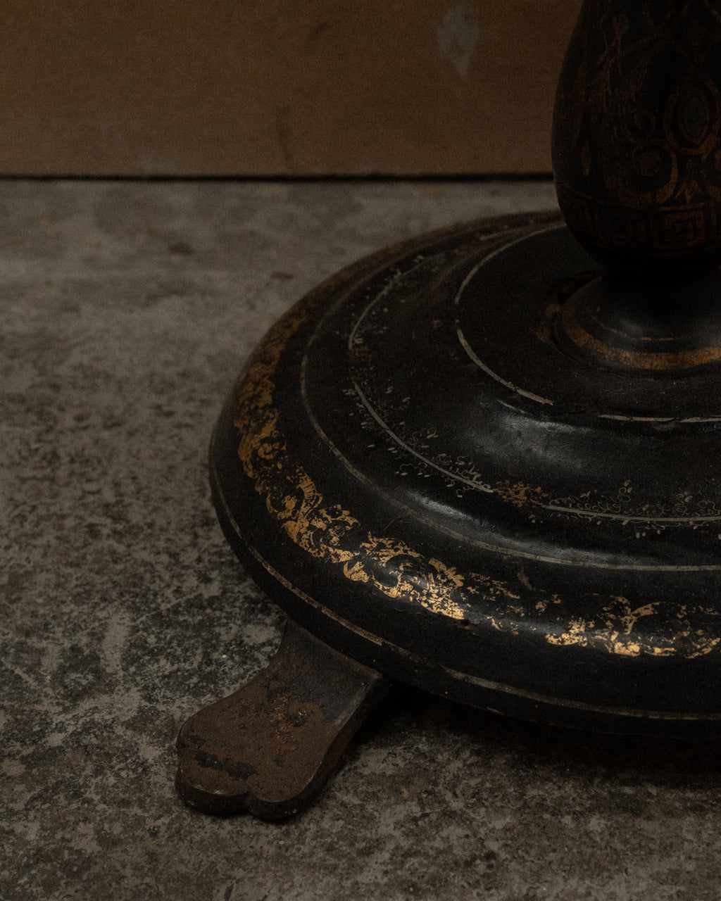 Paper mache and mother of pearl inlaid table likely made between mid to late 19th century