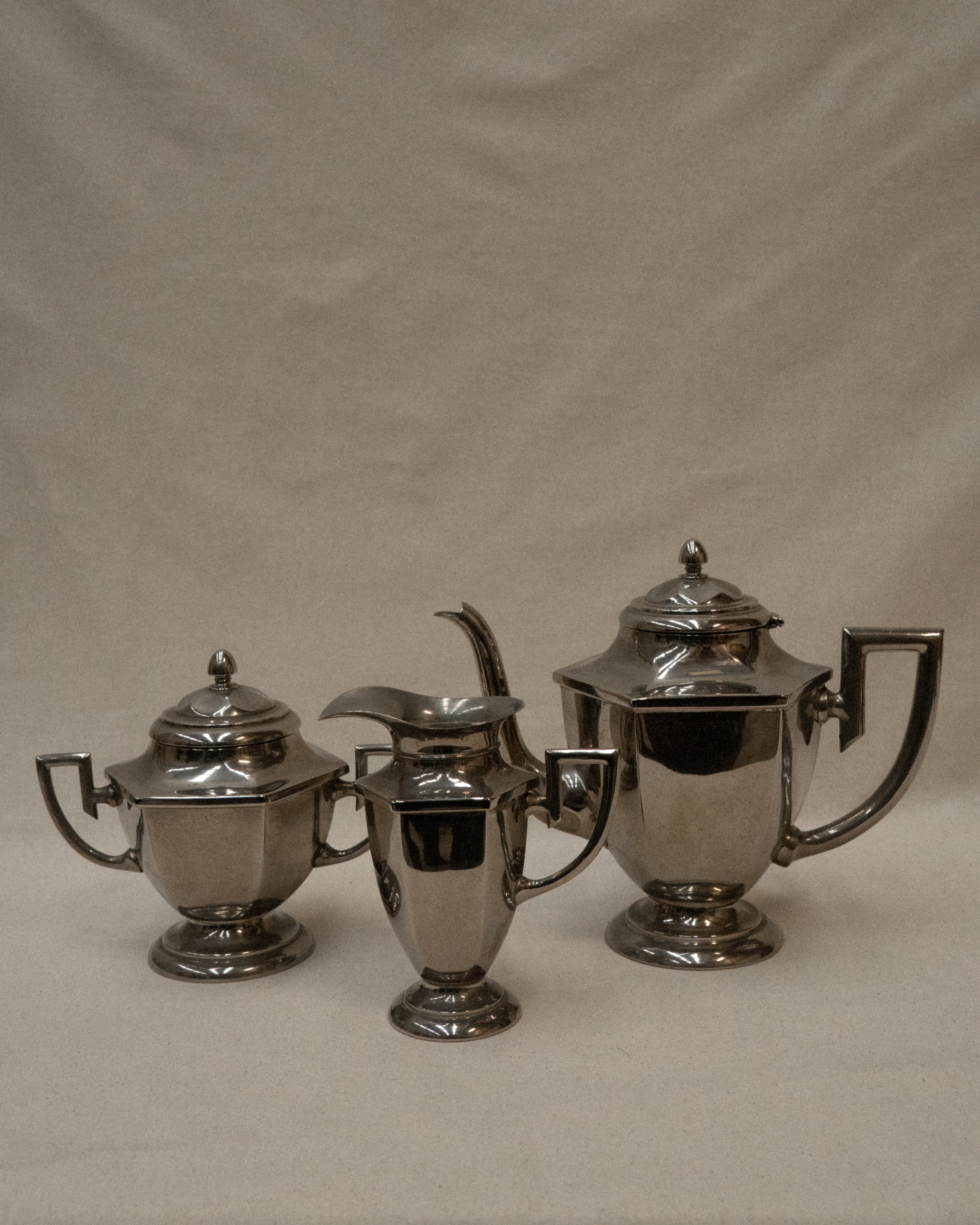 Set of chrome art deco set of coffee pot, sugar pot and milk jug