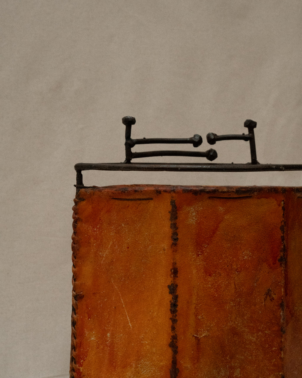 Wrought iron and stained goat hide lamp