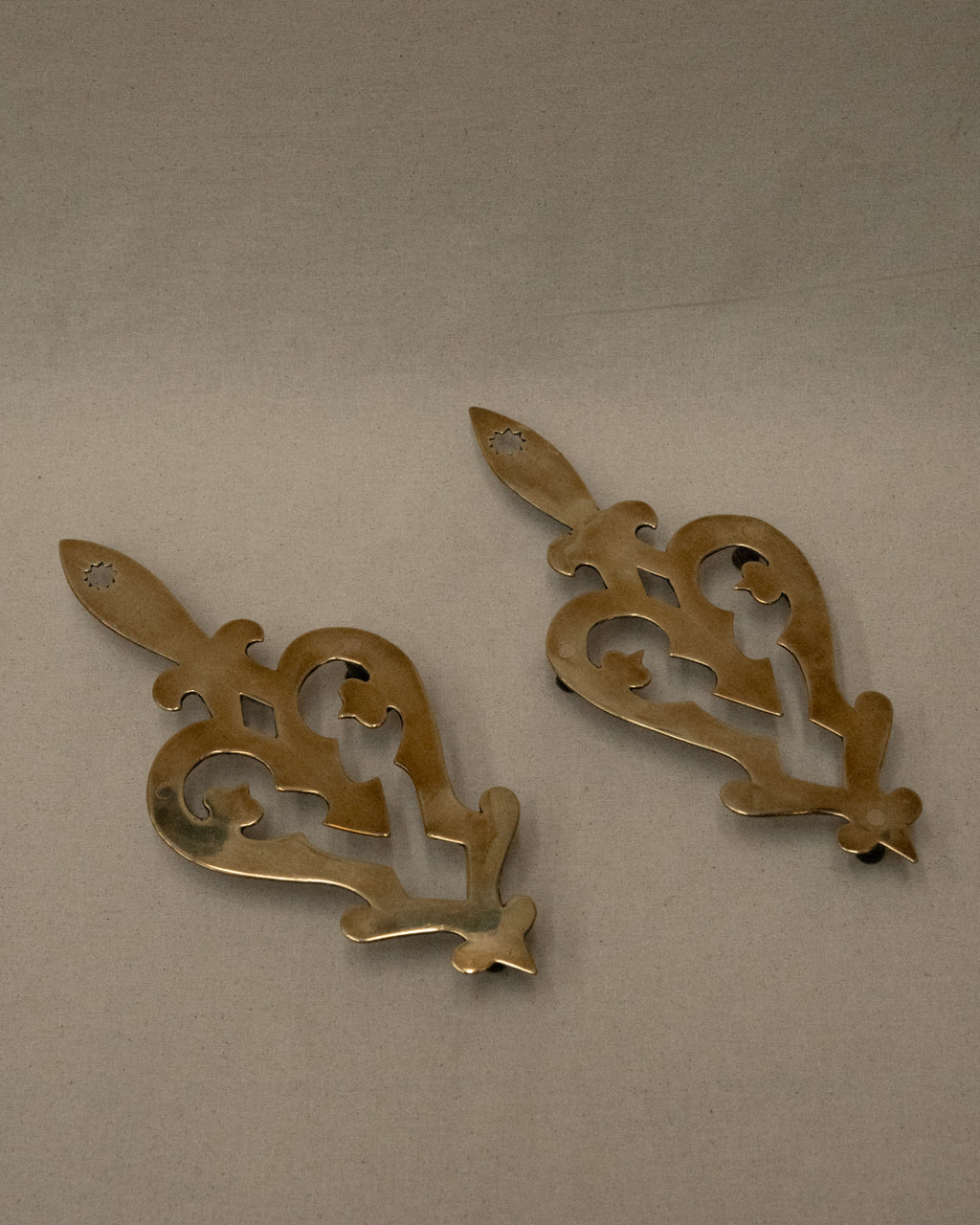 Brass trivets/wall hangings