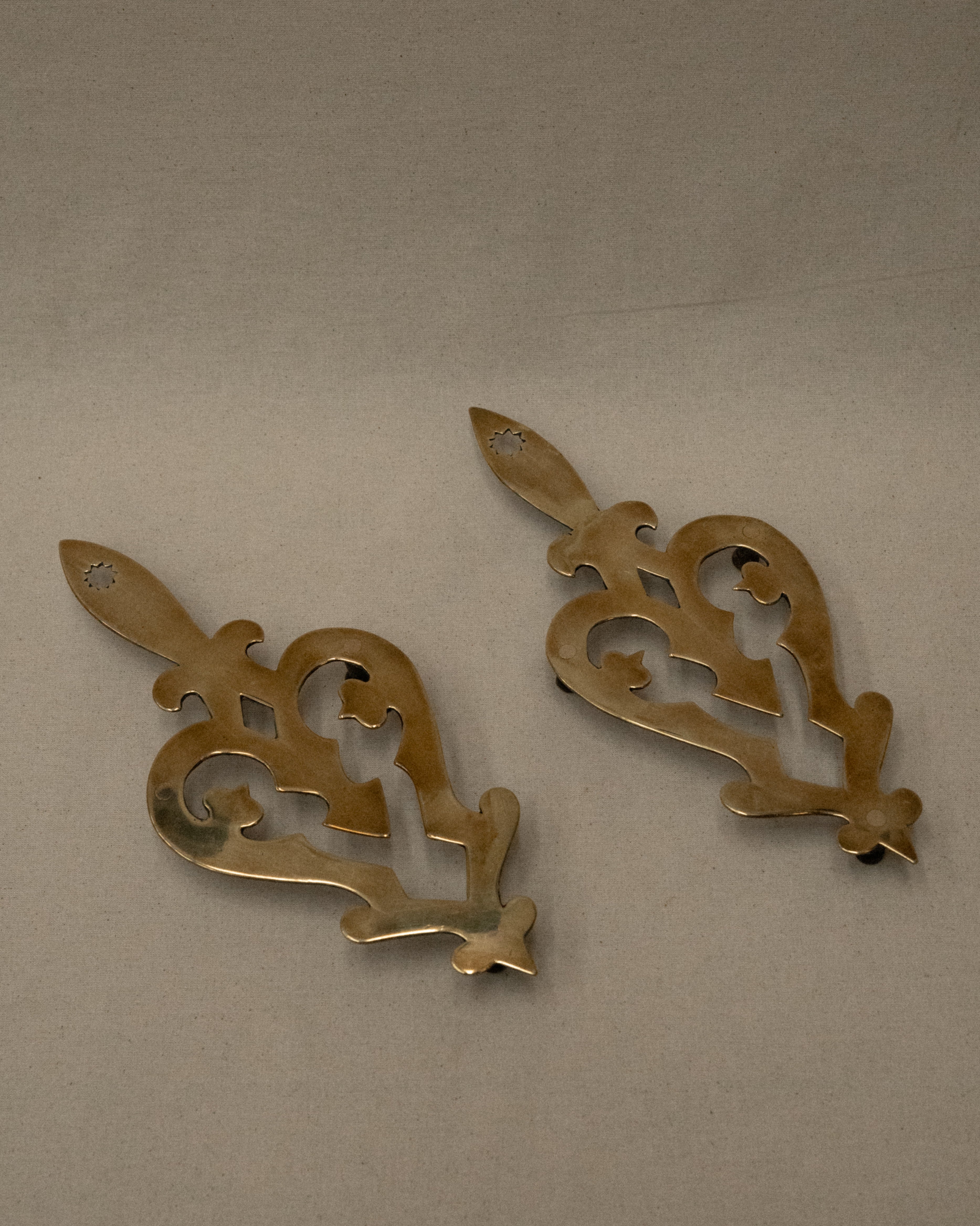 Brass trivets/wall hangings