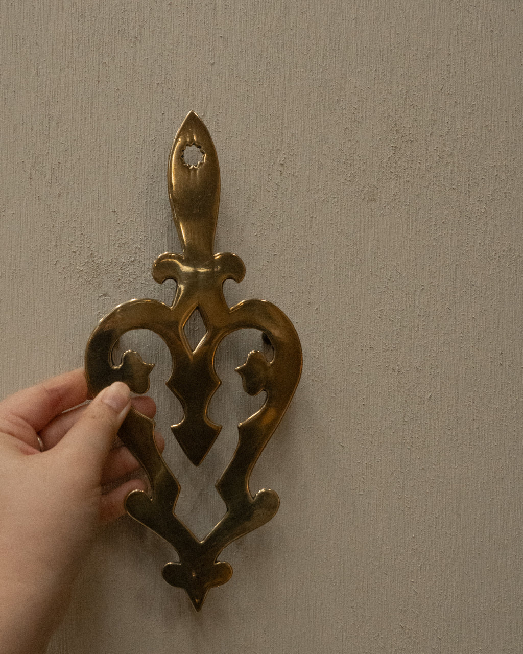 Brass trivets/wall hangings