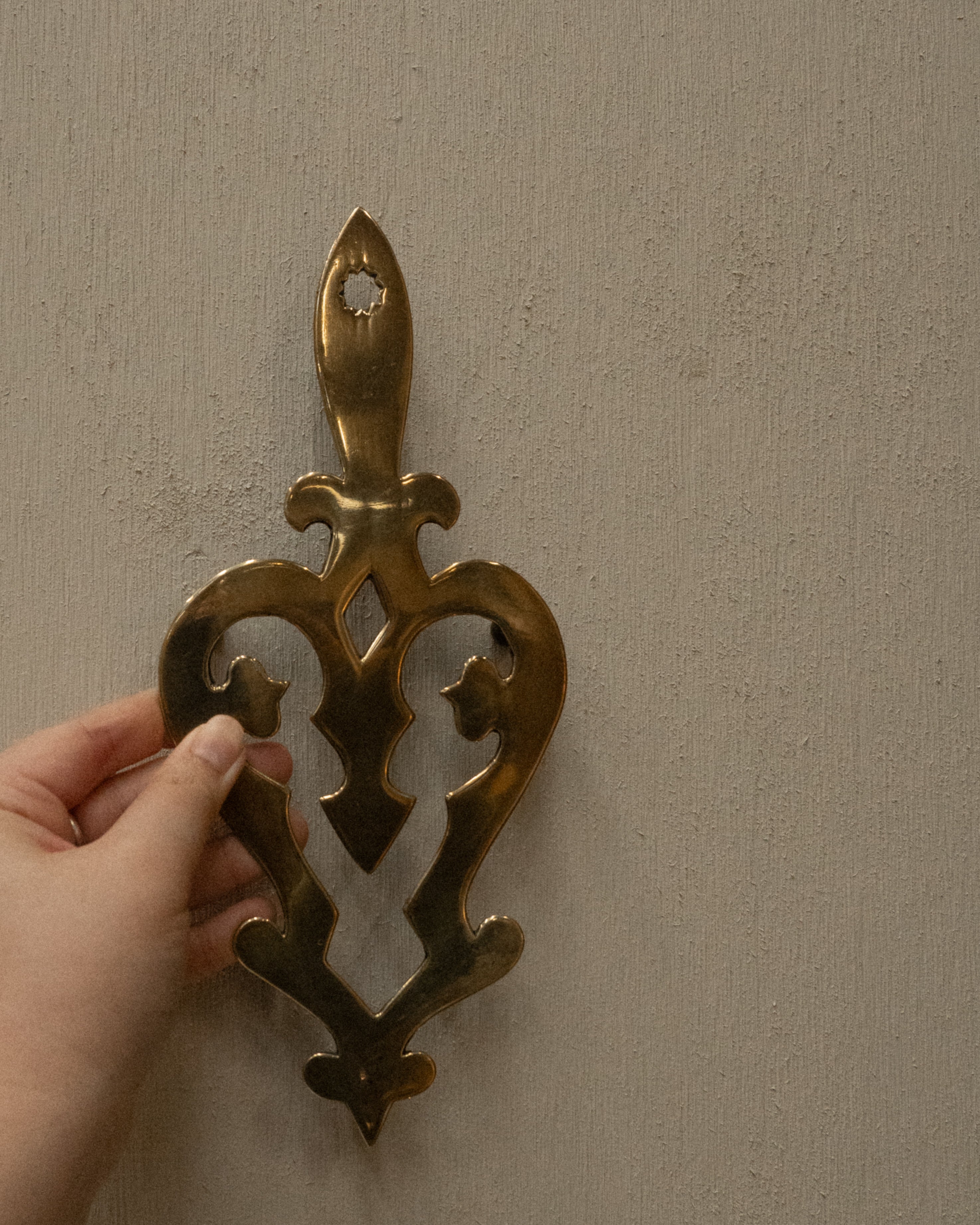 Brass trivets/wall hangings