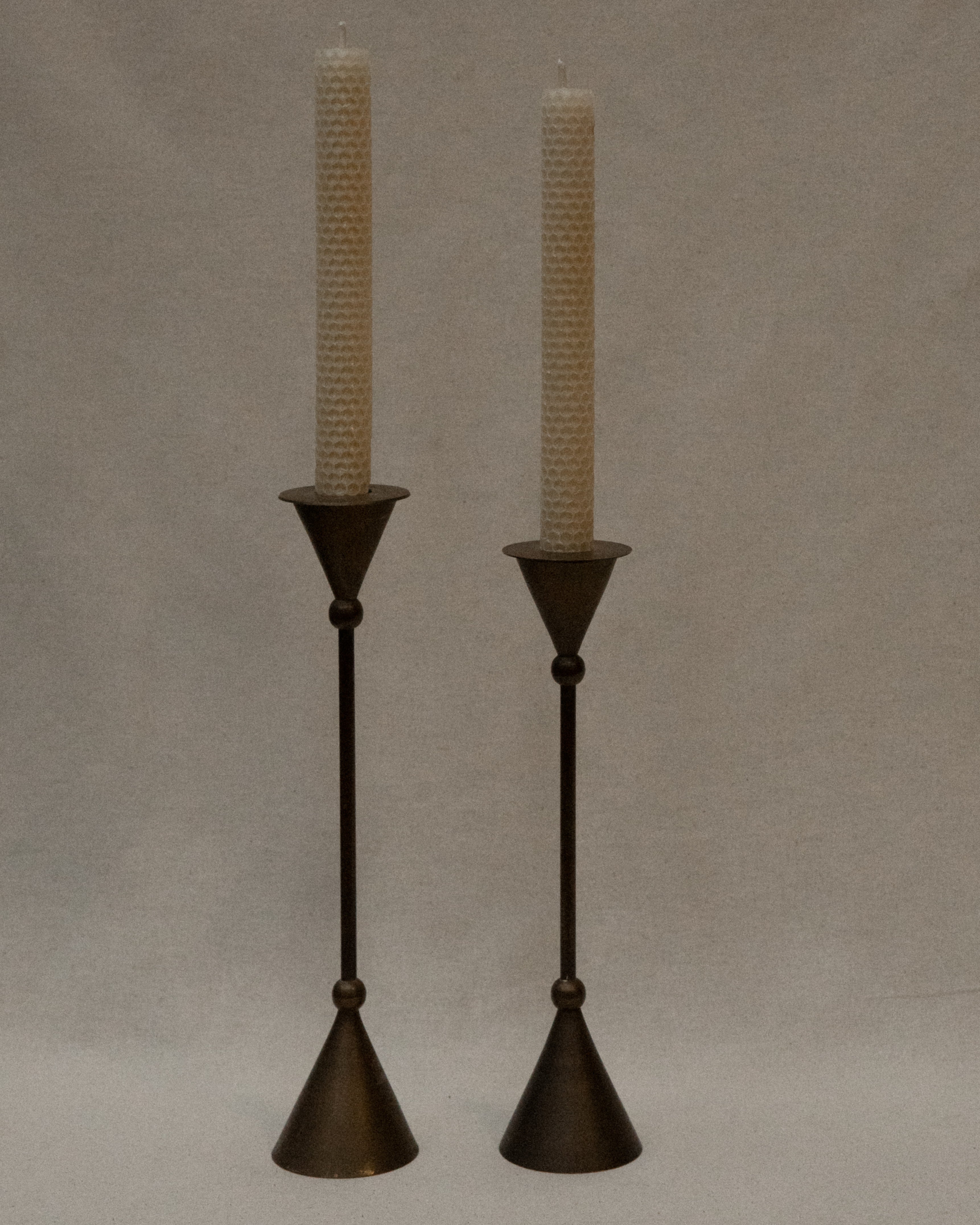 Pair of brass memphis style candle holders
