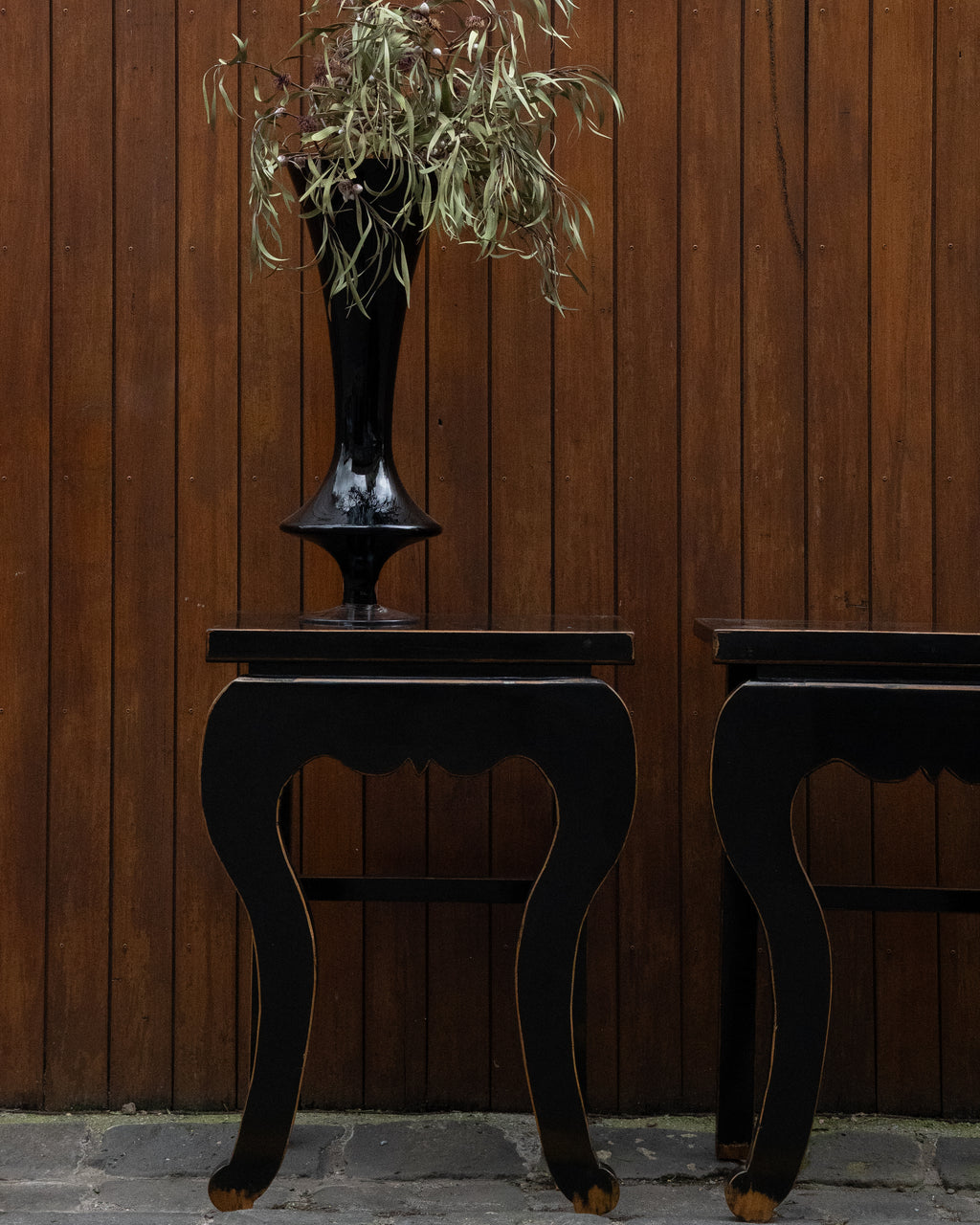 Black laquered chinese table with exposed edges