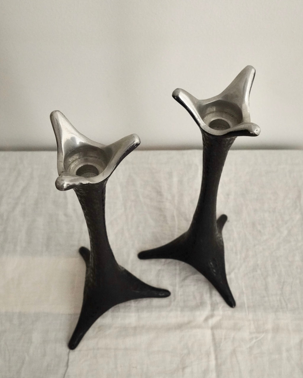 Pair of metal candle holders in black