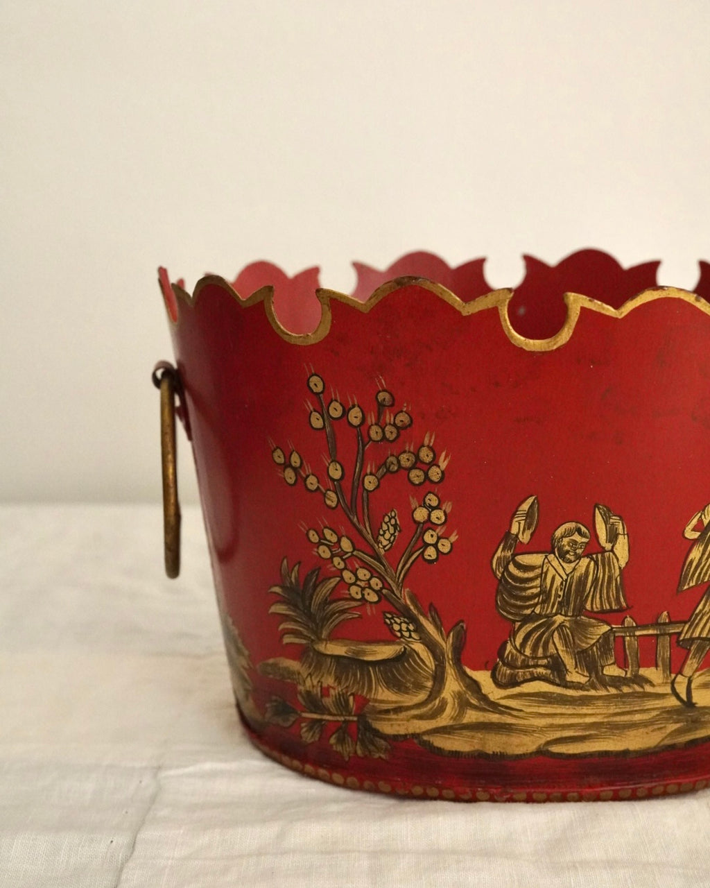 Chinese artwork on red background metal basket with handles