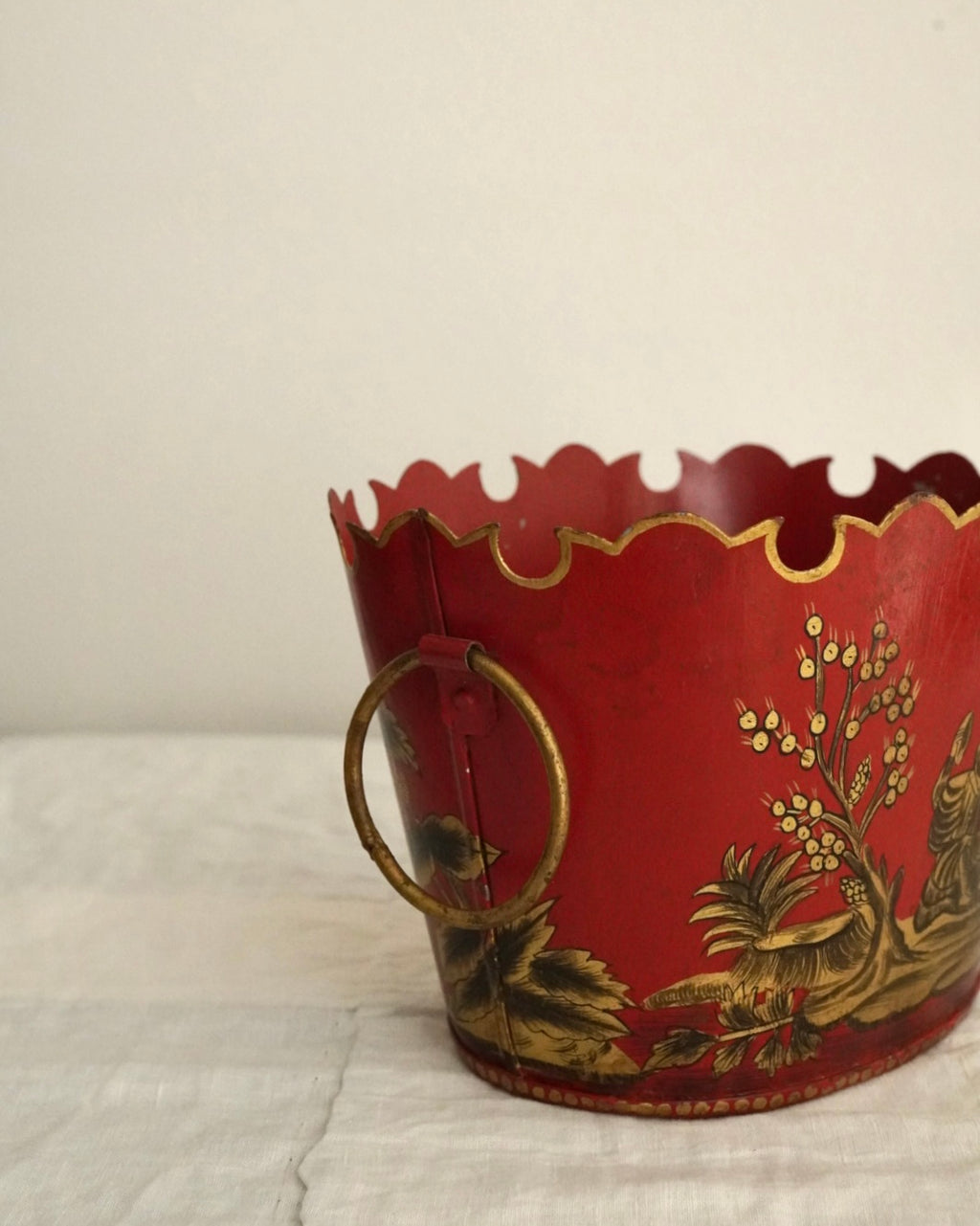 Chinese artwork on red background metal basket with handles