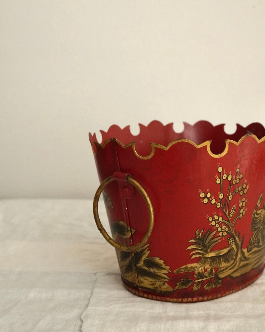 Chinese artwork on red background metal basket with handles