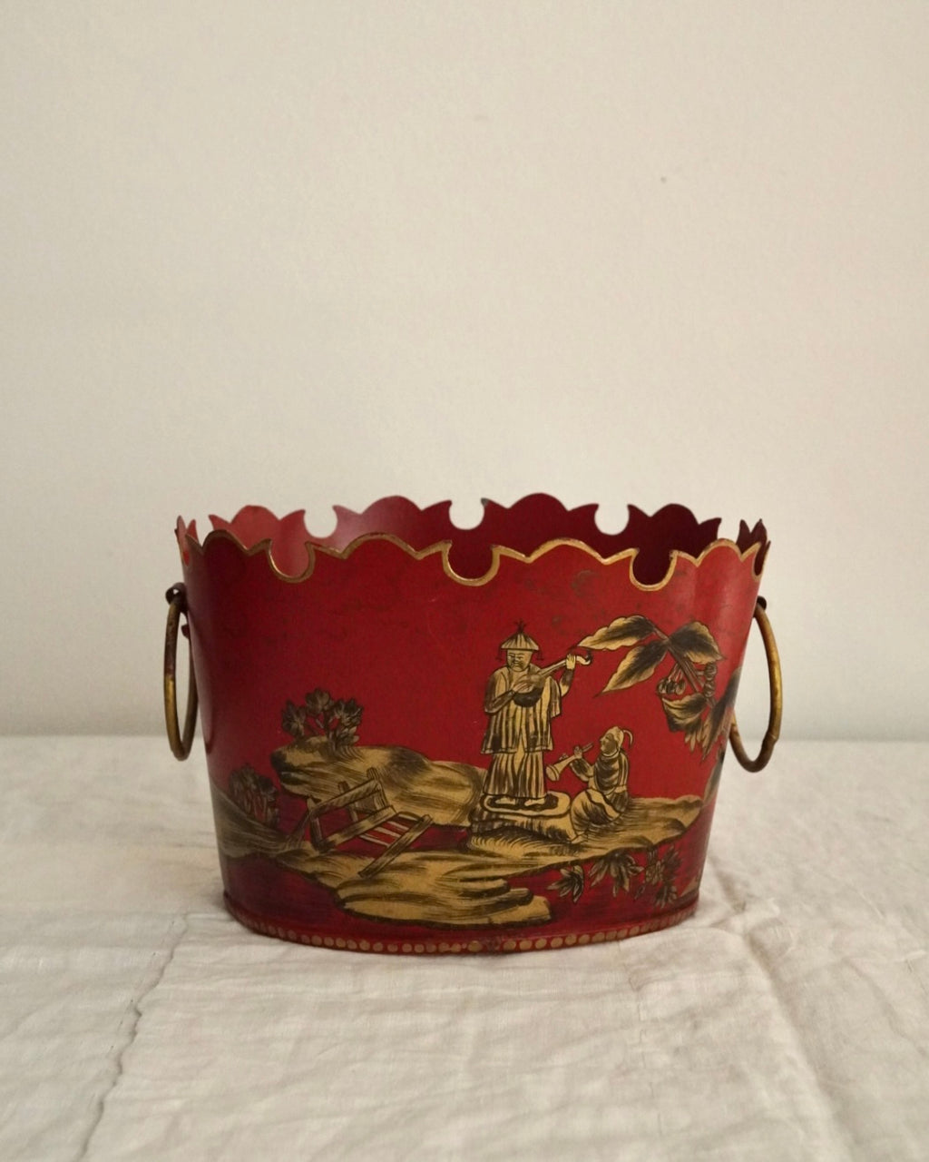 Chinese artwork on red background metal basket with handles